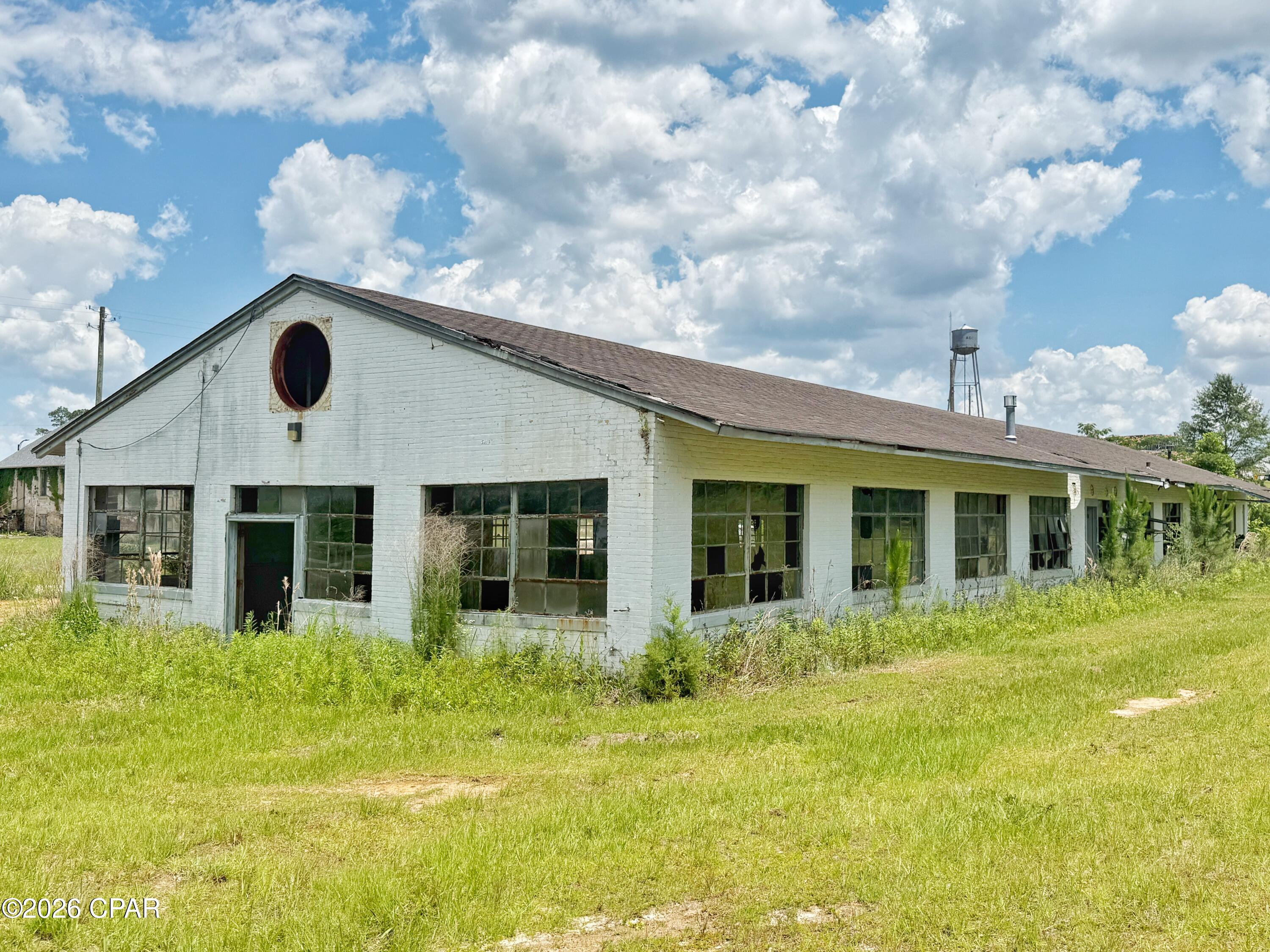 Located within the revitalization area of Endeavor Park, ''The Market'' presents a rare opportunity for an investor or entrepreneur with vision to restore and repurpose a truly unique commercial structure. Positioned on approximately 0.98 acres with excellent road frontage along Penn Avenue, this property offers both visibility and accessibility in a growing area poised for redevelopment.

Conveniently situated just 4,100± feet -- approximately 0.78 miles -- from Exit 136 on Interstate 10, the location provides quick access to major transportation routes, making it ideal for warehouse, distribution, retail, or mixed commercial use.

The character and versatility of the building open the door to countless possibilities, including an antique marketplace, architectural salvage showroom, creative studio space, specialty retail destination, warehouse conversion, or other commercial ventures. With commercial zoning already in place, ''The Market'' is ready for its next chapter.

Whether you are looking to establish a destination business, create adaptive reuse space, or invest in an emerging redevelopment corridor, this property offers location, flexibility, and untapped potential.