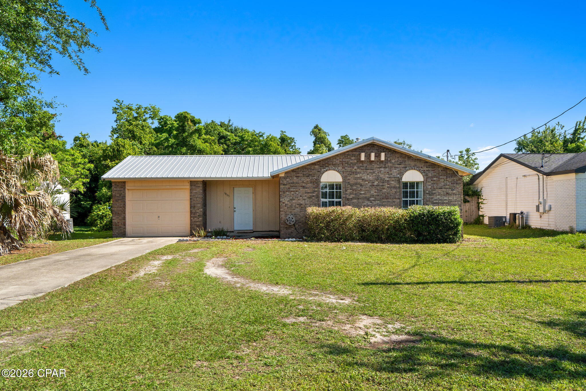 Welcome home to this affordable and well-maintained 3 bedroom, 2 bathroom home offering comfort, functionality, and convenience all in one package. Whether you're a first-time homebuyer, military family, or investor, this property checks all the boxes with a fully fenced backyard, spacious layout, and a massive 20x20 workshop shed perfect for storage, hobbies, or your next project.

This property also presents an excellent opportunity for someone looking for a starter home to begin building equity while adding their own personal touches over time. With solid features already in place and room to make it your own, this home offers tremendous value at an affordable price point.

Located just a quick 5-minute drive to Tyndall Air Force Base, this home provides an ideal location for easy commuting while still enjoying a quiet residential setting. The backyard offers plenty of room for pets, entertaining, or relaxing evenings outdoors. Opportunities at this price point with added workshop space and a fenced yard do not come around often -- schedule your showing today!
