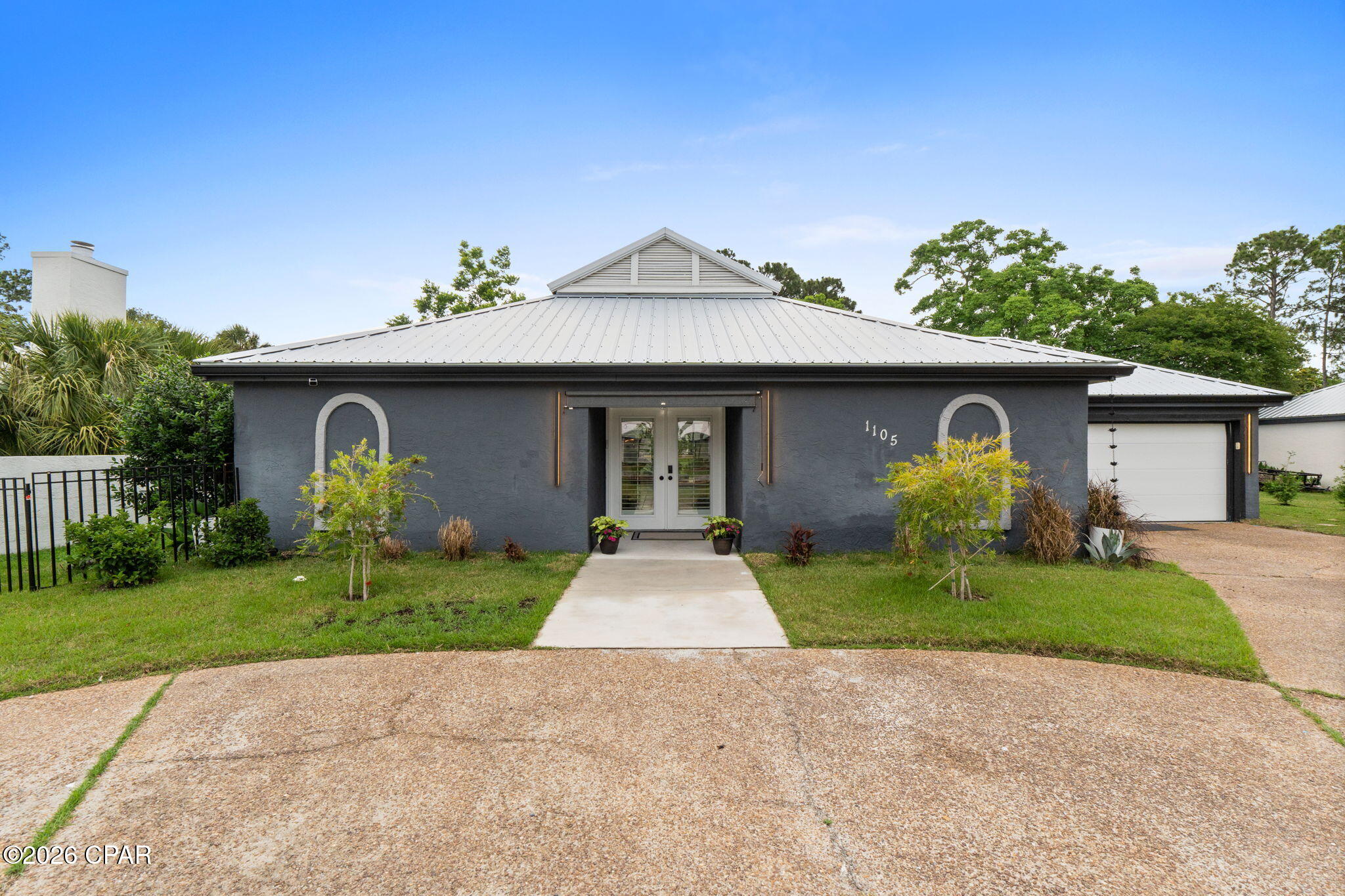 'CURRENTLY UNDER CONTRACT, SELLER WILL CONSIDER BACKUP OFFERS' >>>  Own a home AND THE LAND under it in the sought-after resort of Bay Point for less than $500K; no TLC needed!!!  Beautifully updated home with major system upgrades already completed--offering true peace of mind for buyers. This property features a new roof (2024), new electrical panel, and HVAC (2022)--meaning the most critical and costly components have already been addressed.

Unlike many older homes, this residence has been thoughtfully improved for safety, reliability, and long-term durability. You'll find all-new doors, including storm-rated front and sliding doors, a storm-ready garage door, and upgraded windows designed for protection and efficiency.

Inside, the home combines these structural improvements with comfort, featuring new flooring throughout, fully remodeled bathrooms, and a modernized kitchen with high-grade appliances and a spacious 10x8 island.

Situated on a peaceful lot with a pond view, this single-level home offers not only charm--but confidence. Originally built in 1973, it has been extensively upgraded to meet today's expectations, giving buyers the rare advantage of classic construction with modern systems already in place.  A move-in ready home where the important work is already done - so you can buy with confidence.

Plus the added value and pleasure of living the resort life in Bay Point with a full-service marina, Yacht Club, Nicklaus Design golf course, clubhouse, tennis, and a golf cart friendly community with clubs and social events year-round.  Don't miss this opportunity -- come experience all that Bay Point has to offer.  (All measurements approximate; buyer to verify if important)