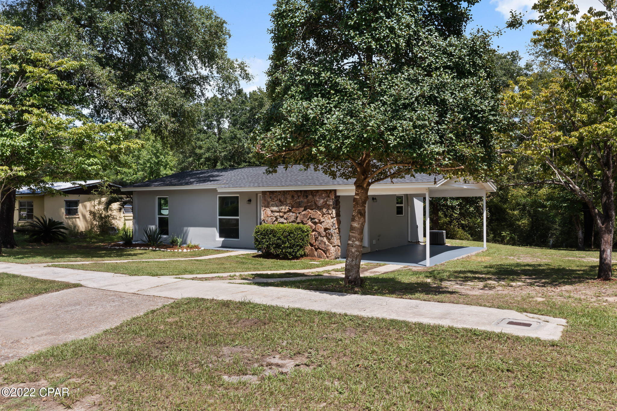 Don't let the age of this home fool you!!!  This home has the perks of a brand new home without the headache of building.  Sunny Hills has lakes, a golf course, and is conveniently located to Highway 77, which allows for quick access to Panama City or Chipley. New Roof, ac, hot water heater, cabinets, windows... too much to list.