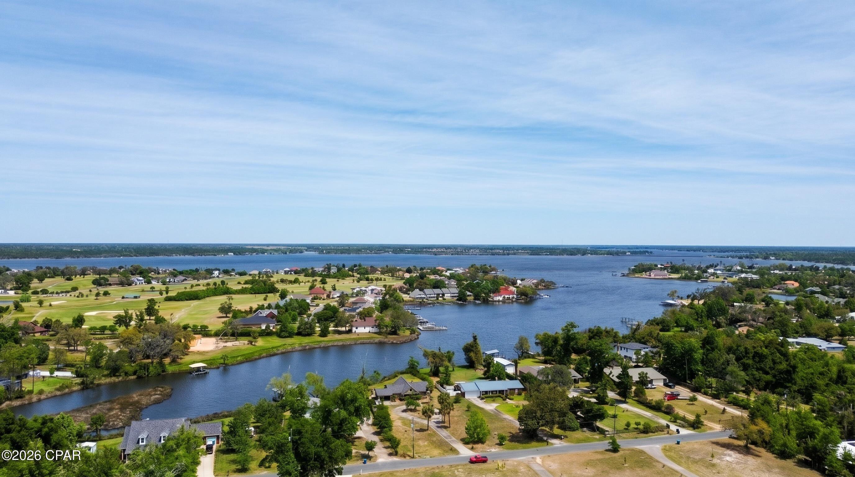 GULF ACCESS! Discover unlimited waterfront potential on this cleared, 0.81-acre lot in Lynn Haven featuring direct deep-water Gulf access. Priced at land value, this property offers an incredible head start for building your custom dream home or completing a rewarding renovation. The existing structure was professionally dried in with a new roof and is currently taken down to the studs, with the sale including fully engineered plans for a 2,268-square-foot, 3-bedroom, 2-bathroom home. Enjoy peaceful views across the bayou to the Panama City Country Club, plus the ability to install a custom dock for your boat. Located in a quiet cul-de-sac  you have the ultimate freedom to park your RV, build to suit, and enjoy an unrestricted coastal lifestyle with no HOA. Offering unmatched possibilities just minutes from the Lynn Haven Boat Ramp, Tyndall AFB, and Panama City Beach, this is your ultimate blank canvas. Schedule your showing today!