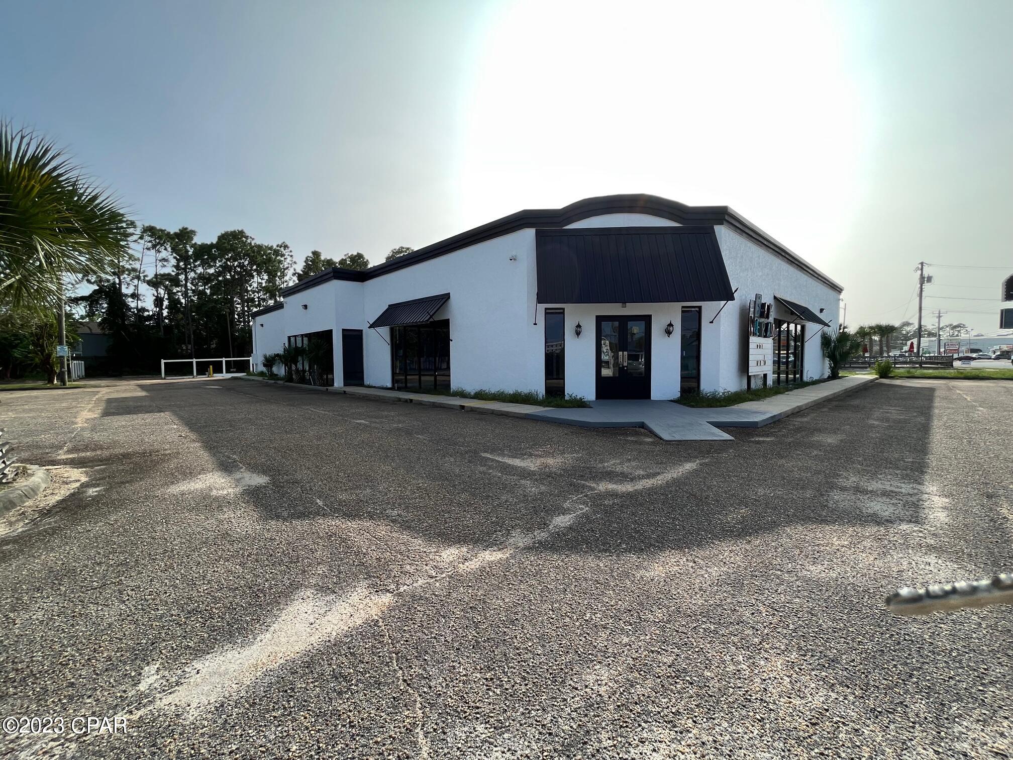 Great business opportunity for a property located on Panama City Beach! This is a high traffic commercial location with a great access point. This property is zoned C-3 with 152 ft frontage on Front Beach Road. Building is on a 1.05 acre lot, 8215 sqft of retail space and 3795 sqft of warehouse space, including two loading docks. Estimated 25 parking spaces + 2 handicap spaces. Loading Dock /Warehouse in back of retail space.