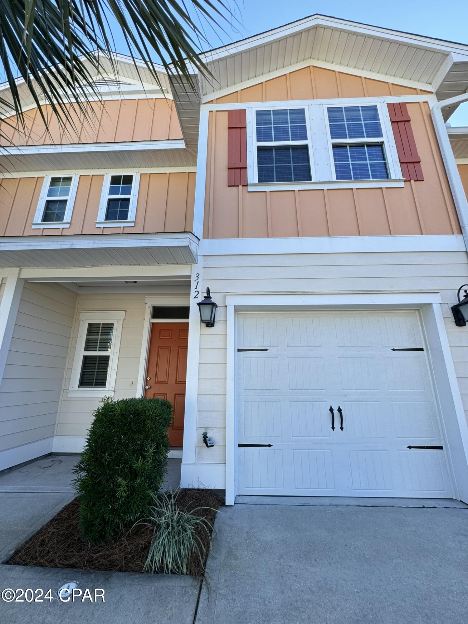 You will love living in Whisper Dunes!  This is an awesome 3 Bedroom 2.5 bath townhouse with a garage located at the quiet west end of the beach.  Immaculate interior, beautiful kitchen with stainless like new appliances, a private fenced in back yard and just around the corner from the community clubhouse and fabulous pool!  Unit even comes with a washer/dryer. This is one of the most sought after communities at the west end of the beach and is now ready!