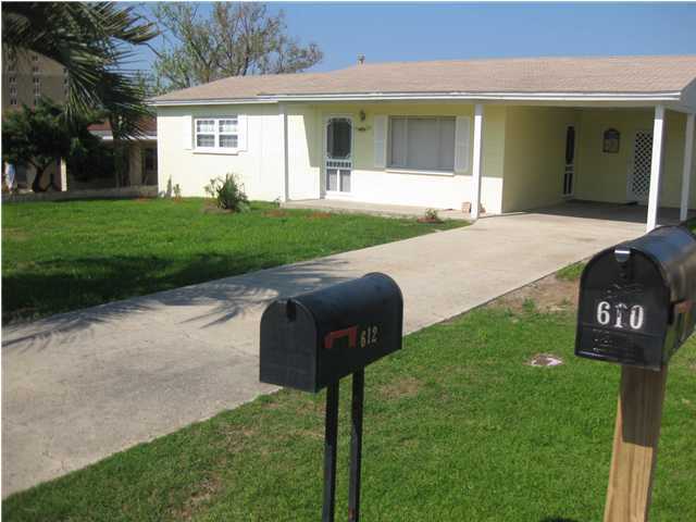 For Rent. Quaint beach bungalow just 1 block from the beach. This home features stainless steel appliances, island-style bar, and tile throughout the living area and hallways. Tenant pays all utilities. **Pet considered with additional non-refundable pet fee of $250.**