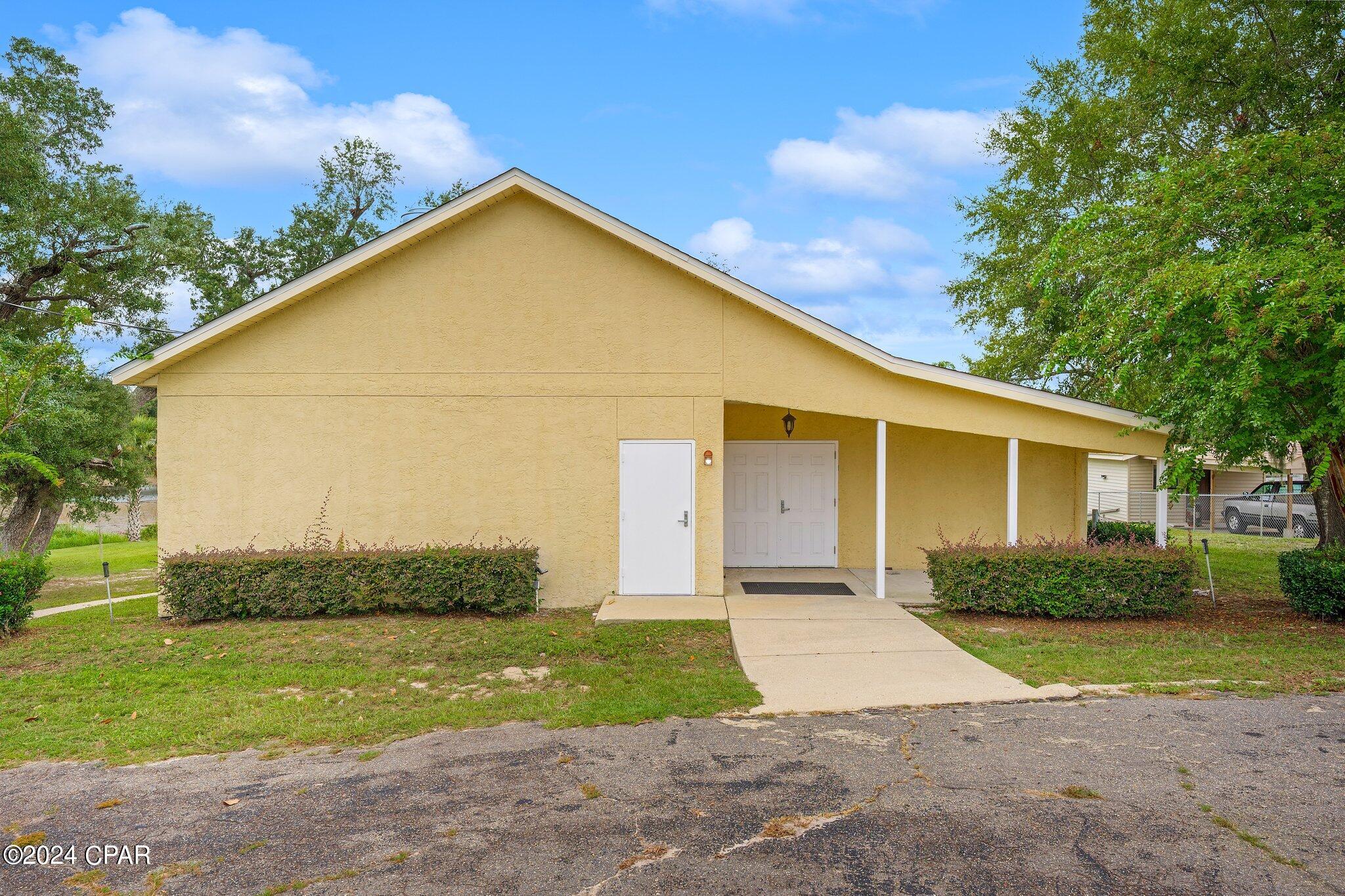 Check out this Unique Water Front property that can be used for a variety of purposes or as your new Residence! This property is comprised of approximately 3825 sq ft total H/C, at approximately 2530 sq ft H/C on the mail level and approximately 1295 sq ft H/C on the lower level! This facility has been used as a meeting place and church and could be converted to a residential home, although a land use exemption for use as ''Clubs, Lodges or Halls'' is in place. The site is comprised of two lots with approx. 200 feet on Martin Lake, and a large paved parking lot. 
The buildings main level features a commercial kitchen, commercial restrooms built to ADA code, Utility closet with water access, 2 meeting rooms(with carpet), foyer area, and Large main hall overlooking Lake Martin with a door leading out to the open deck area as well as another side door exit/entrance!
The lower level is recently finished with new flooring, a full bath, new granite countertop, a large storage room inside and another large storage space you can access from the exterior, and there is added storage with a storage building outside as well.
The roof was replaced in December 2018 and additional interior work has been completed since.
All information should be verified by buyer or buyer's agent if important.  Thank you for considering this unique property, call today for your private showing!