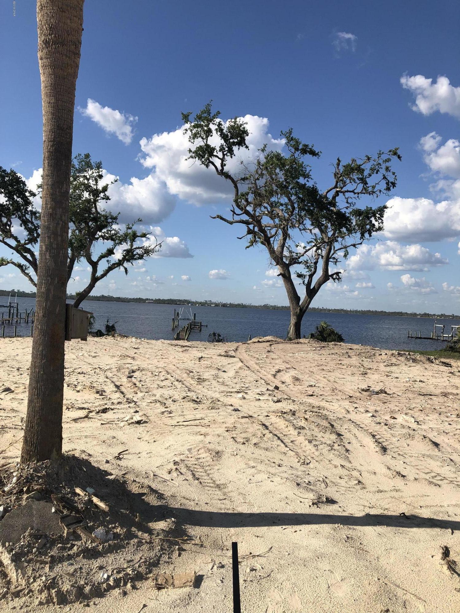A Waterfront view come true! Build your home in this established country club subdivision in Lynn Haven. Perfect for a single family home. Adjacent 30ft lot is also for sale. These lots may be purchased together or separately. All measurements are assumed accurate. Buyer to verify.
