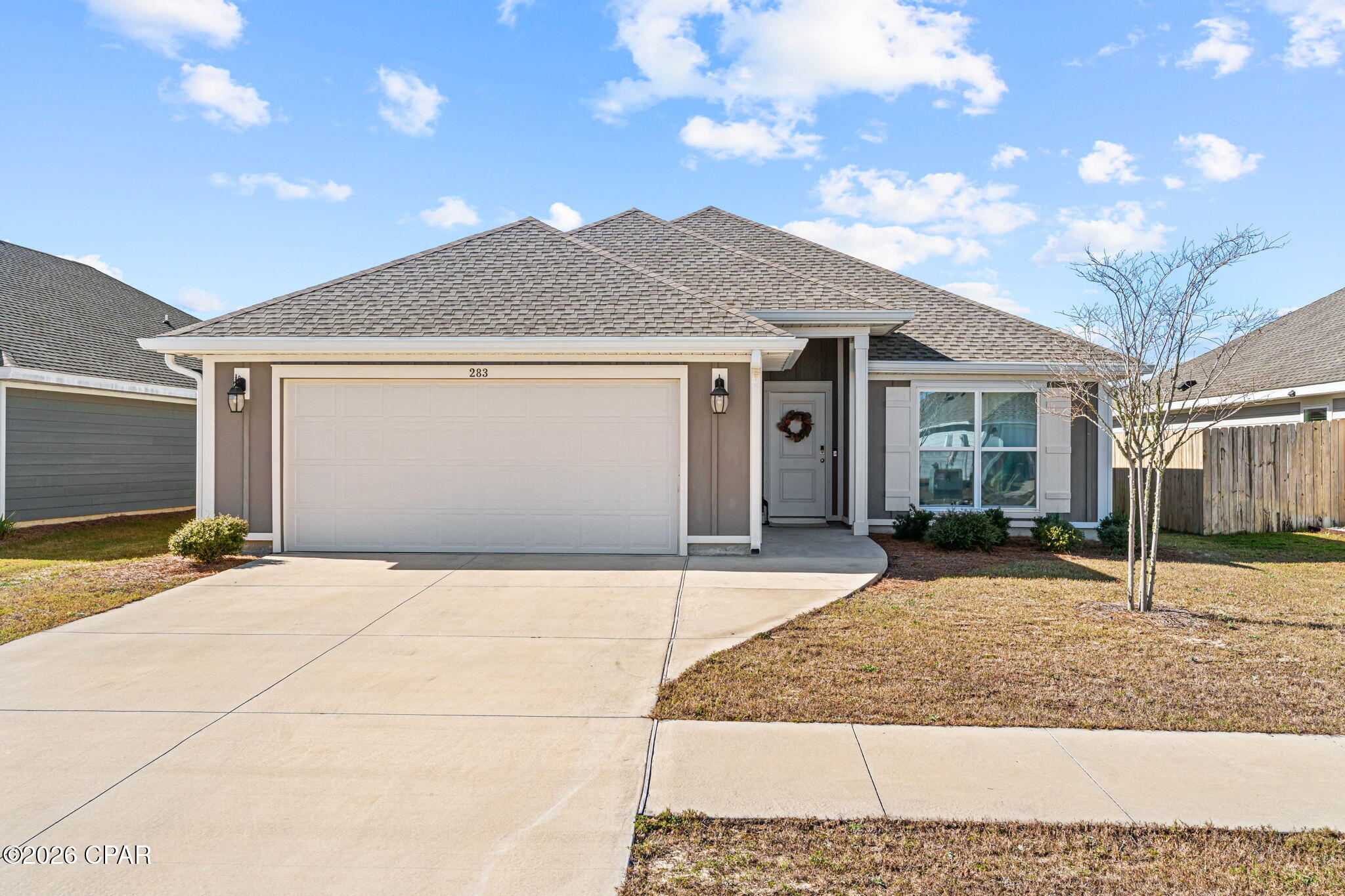VA Assumable Loan 3.625%  Welcome to 283 Bayou Bend Lane-- a truly turnkey, move-in-ready home that feels straight out of a Pinterest board. Built by Truland Homes, this beautifully designed Blue Ridge floor plan is located in the highly desirable Callaway area and offers 3 bedrooms, 2 bathrooms, plus a versatile flex room perfect for an office, playroom, or guest space.

Step inside to an open, airy layout featuring 10' ceilings in the main living areas and a 9' tray ceiling in the primary suite, creating a bright and elevated feel throughout. The home is finished with Luxury Vinyl Plank flooring, granite countertops, and thoughtful design details that make every space feel warm, modern, and intentional.

The exterior is just as impressive, showcasing Hardi Board siding on all four sides, a tankless gas water heater, and a fully landscaped yard with a sprinkler system. 

Conveniently located near shopping, parks, schools, and Tyndall Air Force Base, this home checks every box. Stylish, functional, and truly move-in ready this is one you have to see in person to appreciate.