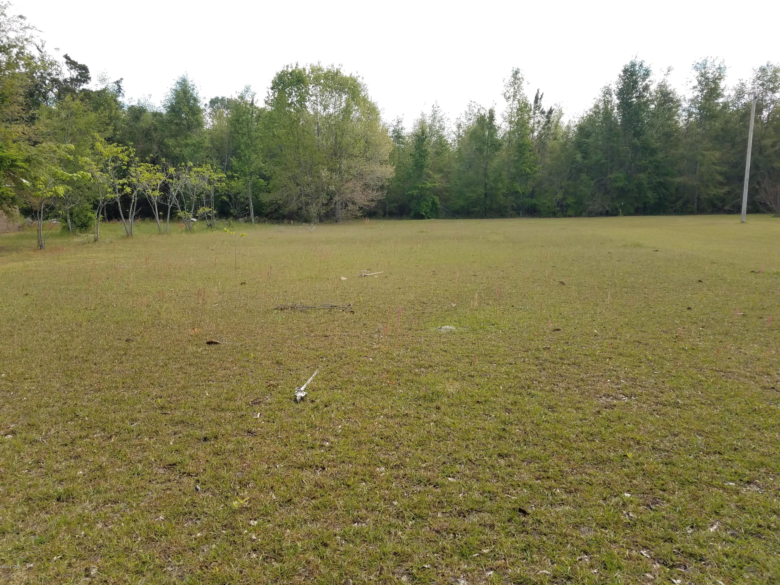 Beautiful .505 acre lot in Greenwood. Cedar trees line the front of this property for privacy. This lot is cleared and ready to be built on.