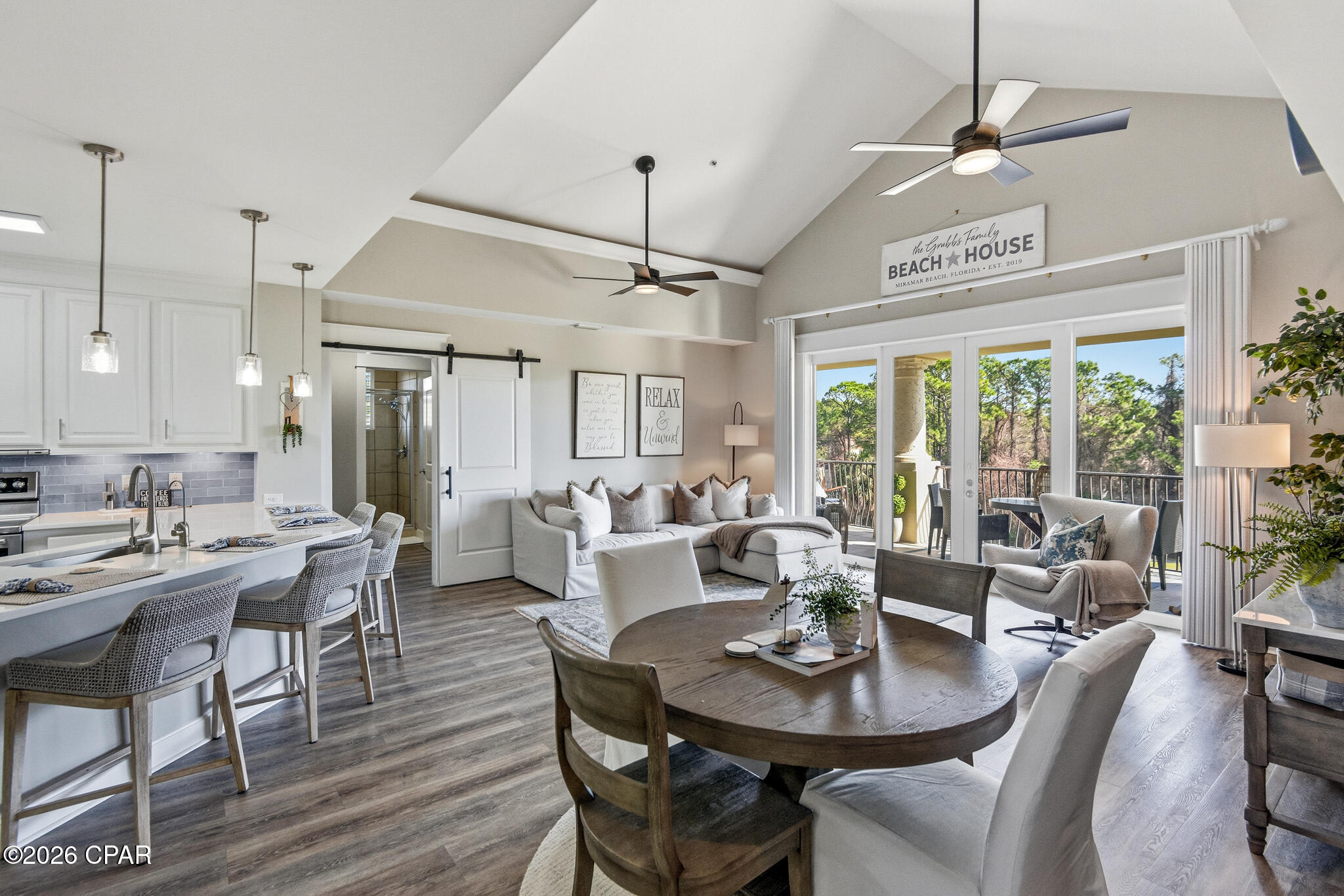 Hard to resist at this price!  This gorgeous ''Resort'' home is located in a gated community in Walton County which has rave reviews. If you are not familiar with sugary looking beaches with Emerald colored water as a backdrop, you are in for a real treat as a member of the Sandestin Owners Association that offers 4 golf courses, a Tennis & Pickleball Club and a Marina. The updated flooring is awesome in this unit, and the spa-like master bath will delight you. The kitchen was recently totally renovated and features a double oven. One great feature you will surely love is the water system that equates to filtered water everywhere. This location is only a short golf cart ride to the Gulf of America beaches AND to fantastic shopping and dining. Not only will you enjoy the layout of this condo, you will truly love the gorgeous furnishings that will excite you the moment you open the front door. There is definitely high-end furniture included. You will also own a private single garage, but this unit comes with your personal golf cart as well. Slow down while you enjoy a cup of coffee and a great book on the roomy balcony that overlooks the golf course. Florida residents do not pay state income tax, so that is one more reason to make this your homesteaded property. Should you want it for your part time use, you would also have the option to rent it out. Short term rentals are allowed in this association. Sellers have receipts for close to $200,000 on the improvements made during their ownership. Too numerous to mention here, a detailed document is available on request, and you won't be disappointed!