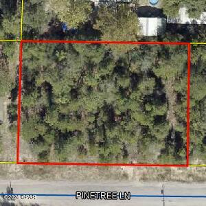 Undeveloped 0.459-acre lot located just minutes outside DeFuniak Springs. This property is ready for a new site-built home or mobile home.  The lot has access to county water and electricity.  Septic system required.