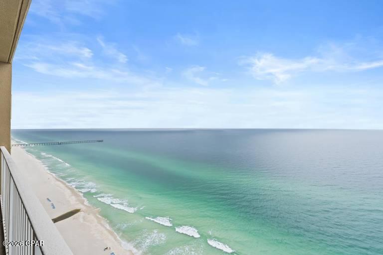 Perched on the 29th floor with rare penthouse-level ceiling heights, this Gulf-front residence offers a noticeably brighter, more expansive feel than standard Tidewater units--an immediate difference you see the moment you walk through the door.

Fully furnished and truly turn-key, this 1-bedroom, 2-bath  plus bunk layout is designed to maximize both comfort and rental performance, easily accommodating guests while maintaining a clean, coastal aesthetic that today's buyers are searching for.

Thoughtfully maintained and updated, the unit features fresh interior paint, a newer refrigerator, updated living room television, in-unit washer and dryer, and a water heater replaced within the past few years, providing peace of mind and minimizing upfront costs for the next owner.

The elevated position on the 29th floor delivers sweeping, unobstructed views of the emerald Gulf waters, while the enhanced ceiling height creates an airy, open atmosphere rarely found outside of top-floor units.

Tidewater Beach Resort offers one of the most comprehensive amenity packages on Panama City Beach, including two Gulf-front lagoon pools, indoor heated pool, Roman spa, sauna and hot tub, fitness center, on-site dining, movie theater, and direct beach access, making it a consistent favorite for vacationers year-round.

Ideally located on the quieter west end of Panama City Beach, yet just minutes from Pier Park, Topgolf, and Pirates Voyage Dinner & Show, this property offers the perfect balance of accessibility and relaxation that both owners and guests value.

Whether you are seeking a personal coastal retreat or a proven income-producing investment, Unit 2903 stands apart with its top-floor feel, strong rental appeal, and move-in-ready condition.