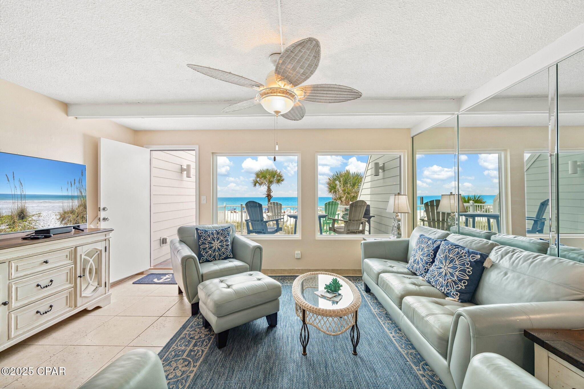 Just 4 minutes from Rosemary Beach! OWN YOUR PERSONAL PIECE OF PARADISE WITH GARAGE DIRECTLY ON THE SAND! NO high rise condos & crowds. NO elevators. NO Milestone Inspection w/large, looming, future assessments. Offering direct, private access to the beach, 271 SF Gulf front decks & stunning Gulf views from almost every room, live the Gulf front lifestyle you've dreamed of while generating income when you're not there! Wake up to crashing waves & after a morning walk on the beach, enjoy your morning coffee on your large Gulf front deck. NEW exterior renovations PAID IN FULL include NEW Hardi plank siding, stairs, extended deck & hurricane impact windows. An updated kitchen w/granite counters & large eating bar, two updated bathrooms & tile flooring accent the roomy interior. The GIANT 2nd floor master suite w/large dressing area, closet & 3rd bedroom provides stunning Gulf views & plenty of space to add an add'l bedroom, bathroom and/or living area. Ideal as a primary home, beach home, or investment property, this 2 level Gulf front townhome w/2 car-garage comes fully furnished & is turn-key. Enjoy lazy days on the beach, and picturesque sunsets from your large, Gulf front deck. A storage room for beach chairs, coolers & floats is conveniently located off the living room deck just steps from the beach. Perfectly located just 3 minutes from 30 Avenue and 4 minutes from Rosemary Beach, fantastic restaurants and shopping are just minutes away. Act now & start living the Gulf front lifestyle you've dreamed of.