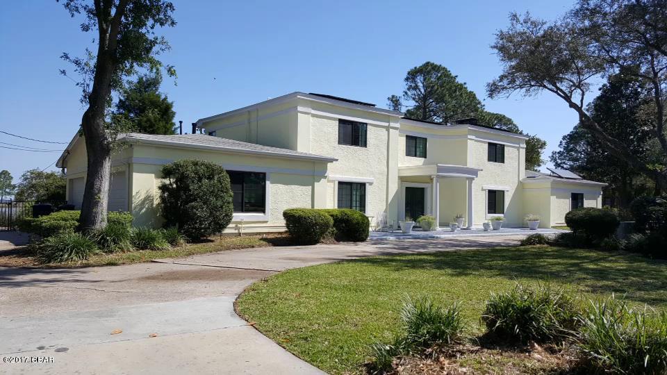 Deck is being replaced, new carpet downstairs, new roof. All will be completed prior to occupancy! Home may not be available until late December. ENERGY EFFICIENT HOME. New windows, new sliders, and new store-front windows (2014-2016) overlooking the Bayou providing a breathtaking panoramic view. Two solar water heaters and 6kw solar panels (2014) saving $$ from your monthly power bill. Private well and septic eliminate need to pay for water and sewer. Three HVAC units providing zoned heating/cooling (2014/2015). Propane fuels one HVAC unit (heat), back-up water heater in rare event solar goes out, and starter on fireplace. Oh, the wood-burning fireplace. See-through for romantic evenings in family room and/or master bedroom, or just additional heat in the winter to reduce the power bill even more. Entering from the front door, you are greeted with 18-foot ceilings, curved grand staircase, and the French balcony in the upstairs bedroom. Large family room has massive 18-foot ceiling, and a wet bar with Scotsman ice machine. Large Master bedroom has TV/reading area. Master bath has separate vanities, whirlpool tub, large double-head walk-in shower, and large walk-in closet. Office/4th bedroom on 1st floor with deep closet, built-in shelving, and adjacent full bathroom. Sliding doors in kitchen, dining room, family room, and Master bedroom open to the huge multi-level deck, overlooking the water, with a boardwalk, koi pond, and sitting area to enjoy the sunsets. Downstairs also features the eat-in kitchen (granite counter tops, convection microwave), generous sized laundry room, butler's pantry, formal dining room, and oversized garage. Upstairs hosts the second living room overlooking the family room, and also has a balcony with spectacular views. Also upstairs are two large bedrooms and a large bathroom. Marble-look windowsills throughout. Never-ending closets and storage spaces in every part of the home including all bathrooms and garage, which also has a workbench. Another fountain adds to the ambiance out front, with a large circular drive and nice yard. This home has received many repairs/upgrades in the past four years, and has also been painted inside and out. Please ask your agent for the list of improvements. All age, size, dimensions approximate. Please verify if important.