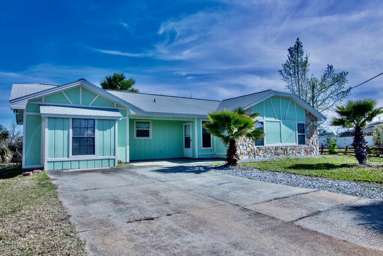 CURRENTLY UNDER CONTRACT, SELLER ACCEPTING BACKUP OFFERS Located on Martin Lake, this 3-bedroom, 2 bath canal home has so much to offer.  The ROOF was replaced in 2017, HVAC (inside/outside units) replaced in 2019, and the WATER HEATER replaced in 2019.  The garage has been converted to create a 13x20 bonus room, which could be used as a fourth bedroom or second living room.  This home has so much to offer including a 20x20 covered porch, and open patio for grilling, where you can take in nature and enjoy your large backyard and privacy.  Another great feature of this home is that it is all ceramic tile for easy maintenance (no carpet).  As you walk in the front door you have a straight view through the living room to the backyard,  Enter on ''MORE'' with the kitchen, bonus room, and laundry room to the left, and the 3 bedrooms and 2 baths to the right of the home.  See the video walk through under the picture section in the MLS.   There is so much I can say about this home but you must make an appointment to view it to appreciate everything it has to offer.  The seller has priced it to sell and it won't last long at this price.  Home is in an X/AE flood zone but sits 9 feet above flood elevation. See under documents elevation certificate and survey. Private Quote of $337.85 or Gulfstream $422.  Flood insurance is very reasonable. Age, Sq.Ft., Room Dimensions, Taxes, Schools, or any important information must be verified by the buyer if important via appraisal, survey, professional or personal inspection.