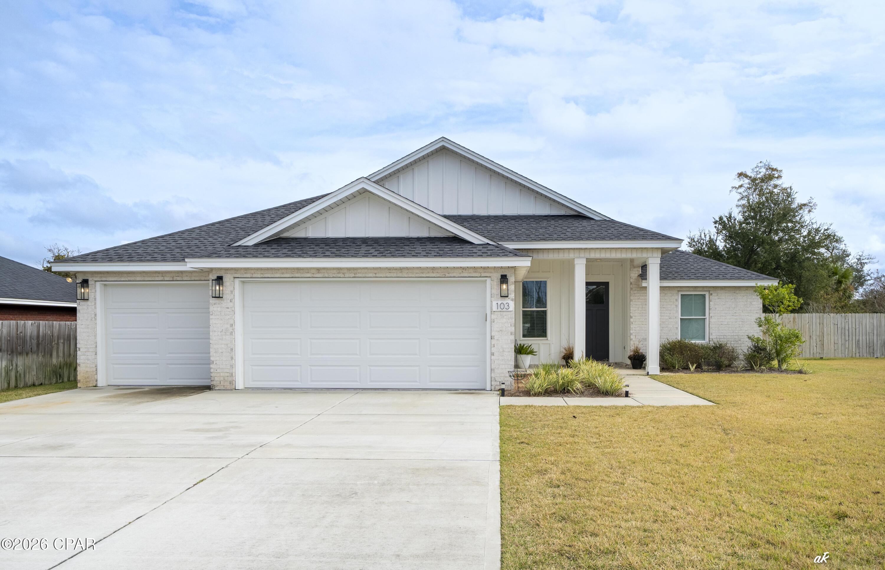 This beautifully crafted 5-bedroom, 2-bathroom home offers exceptional craftsmanship, thoughtful design, and a highly desirable Lynn Haven location. Situated on an oversized lot in a quiet, established neighborhood adjacent to NatureWalk Golf Course, this home also benefits from easy access in and out of the community as one of the first homes near the neighborhood entrance, a major convenience for everyday living.

Inside, custom cabinetry throughout showcases the attention to detail that sets this home apart. The open-concept living area is perfect for entertaining, while the split-bedroom floor plan provides privacy and functionality for the entire household. The primary suite serves as a relaxing retreat with a spa-like bathroom and double vanities.

Just off the kitchen, the oversized laundry room doubles as a multi-purpose space with built-in shelving, ideal for extra storage or organization. Outdoor living is effortless with a covered porch and a fully fenced backyard, perfect for pets, play, or future outdoor enhancements. A spacious three-car garage completes the home, offering ample storage and parking.

Located next to NatureWalk Golf Course, this home combines scenic surroundings with everyday convenience. Residents enjoy close proximity to top-rated schools, local parks, and shopping. A Publix shopping center near Highway 231 is just minutes away, along with easy access to Panama City and surrounding areas.

Nearby favorites include Sharon Sheffield Park, A.L. Kinsaul Park, and Lynn Haven Bayou Park & Preserve, offering playgrounds, walking trails, waterfront views, and year-round community events.