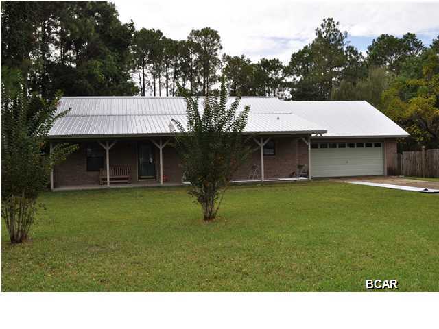 **NEW METAL ROOF JUST ADDED AND SELLER OFFERING HOME WARRANTY** This is it...the home you have been waiting for! Lots of updates and style in this 1-story Shoreline Estates home with a view of Laird Bayou. You'll love the look of the wood floors as well as how easy they are to maintain. The family epicurean will appreciate the renovated kitchen with its custom cabinetry, state-of-the-art appliances and solid-surface countertops. There's even two pantries, one with roll-out drawers for better accessibility. The home has a split-bedroom floor plan with a master suite fit for a king! Included is a hot tub in the master bath, several standard closets and a walk-in closet, and an adjoining office with French doors that open to the den. This is a floor-plan the entire family will enjoy! For