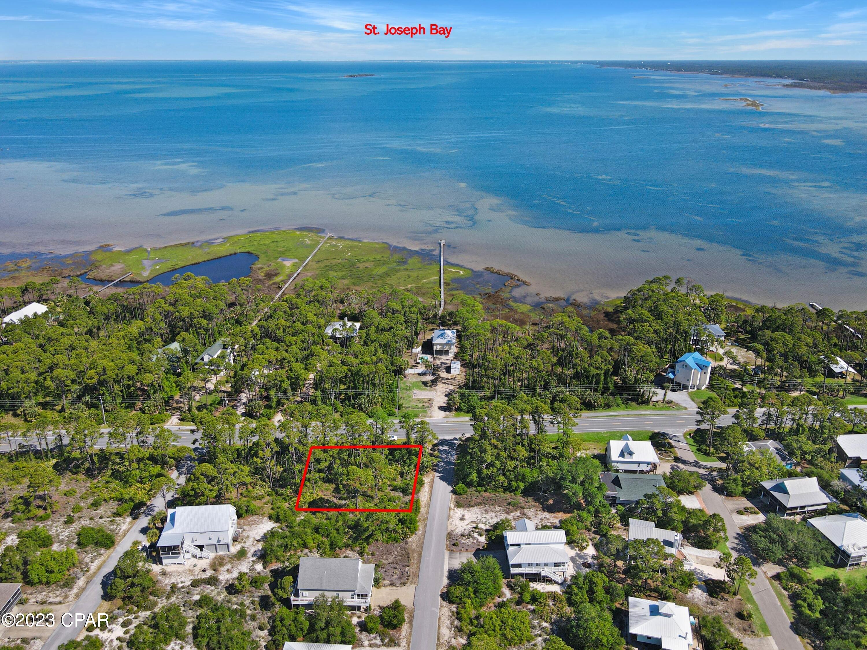 MUST SEE 1/4 ACRE HOME-SITE JUST A SHORT WALK TO BEACHES & THE GULF OF MEXICO IN THE COMMUNITY OF SURFSIDE ESTATES! Don't miss the opportunity to own a beautiful piece of property w/deeded access to pet friendly white sand beaches on the S Cape. Two story design plans could potentially provide peekaboo Gulf & Bay views. Fish from the shoreline, surf the waves or launch your boat at one of many nearby boat ramps. Reasonable HOA restrictions & architectural guidelines are customary. Dig your toes in the sand & enjoy the laid-back atmosphere of the Cape or bike the 8 mile stretch of paved trails to keep fit while on vacation. Nearby family friendly Salinas Park is a favorite place to visit for horseback riding, kayaking & pickleball. You are one step closer to living the beach life! Call today for a showing & tour the area! .