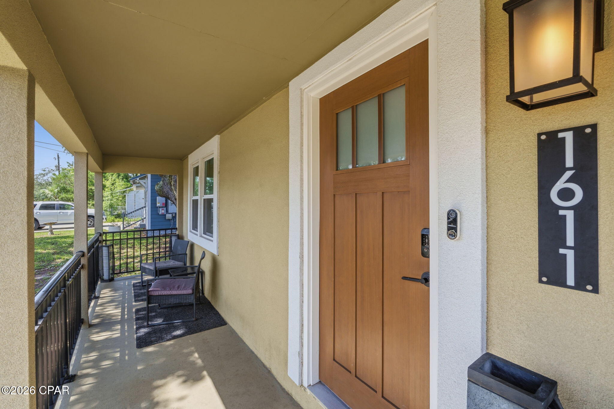 Rare opportunity in St. Andrews! This fully remodeled three-bedroom, two-bath home is being sold with a separate waterfront parcel on Lake Huntington, located approximately 300 feet from the residence. The list price includes both properties, and they must be sold together.

The home features luxury vinyl plank flooring, recessed lighting, updated fixtures, and an easy flow between the living room, kitchen, and dining area. The remodeled kitchen offers white shaker-style cabinetry, solid-surface countertops, stainless steel appliances, a gas range, and an adjoining coffee or beverage station. The oversized primary suite includes a private bath and a large closet with a built-in organization system. Additional features include two guest bedrooms, an updated guest bath, a spacious laundry room with a folding counter and storage, updated windows, modern ceiling fans, and a tankless water heater.

Outside, the large fenced lot provides a gated driveway, abundant parking for a boat or trailer, patio space, and an above-ground pool. The separate 0.064-acre waterfront parcel measures approximately 50 by 75 feet and offers roughly 50 feet of frontage on Lake Huntington. The waterway provides access toward St. Andrews Bay and creates a private setting for fishing, kayaking, watching the sunset, or potentially adding a dock or boat lift. No dock or boat lift is currently installed. Buyers should verify water depth, navigability, boundaries, and permitting requirements for their intended use.

Short-term rental use is permitted at the residence, subject to obtaining all required licenses, registrations, and approvals. The home is also within walking distance of Historic St. Andrews, locally owned restaurants, waterfront parks, shopping, entertainment, and the St. Andrews Marina. This property offers a rare combination of a remodeled home, short-term rental potential, boat parking, a walkable St. Andrews location, and nearby privately owned waterfront. All measurements and information should be verified by the buyer if important.