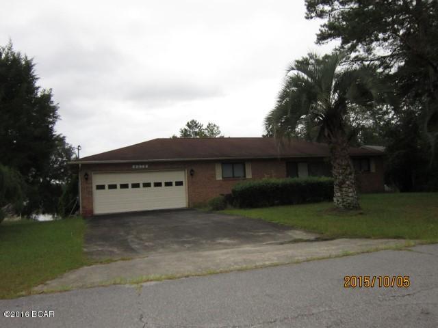 PRICE REDUCED!!! WATERFRONT ON BOAT LAKE!!! Brick, three bedroom, two and a half baths, Kitchen with breakfast bar, dining area, large living room, large sunroom overlooking Boat Lake, with deck off sunroom, nice office or computer room with 1/2 bath. Down stairs you will find a 12 x 23 bonus room for guests or play room, also overlooking Boat Lake. Patio at ground level on back of house. House features a two car attached garage, trees and landscaping. This house and property has been well maintained and will qualify for any type of financing. Bring your prospects to see this one.