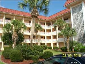 Golf course condo living at it's best. This is a 2 bedroom, 2 bath ground level well furnished condo located next to Colony Club Golf Course, and over looking the pool and par 3 golf course. Very well kept, includes a enclosed screened patio with access from the master bedroom, and ext to common area leading to the pool. No pets.
