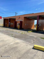 PRICE REDUCED.Motivated seller! OWNER FINANACING WITH 25% DOWN. Nice lot with a concrete structure on it. There is an office in the center of 4 concrete structures that are open in each end. At this time cannot be used as a car wash.
Close to Tyndall AFB with steady traffic daily.