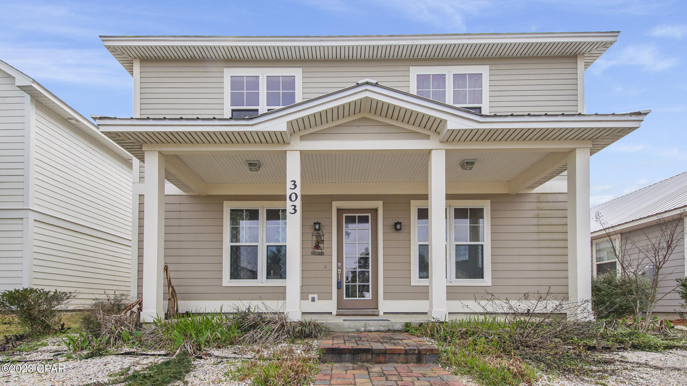 Beautiful 4 Bed 3 Bath home in sought after Turtle Cove on West end of Panama City Beach. Granite countertops, Gas Range, Detailed wood trim throughout. Hardwood and tile floors. Gas fireplace.  Brick paver driveway, Covered back porch. Hardi Plank Siding, 2 lots away from Community clubhouse,  pool and fitness center. Across the street from water. Must See to Really Appreciate!