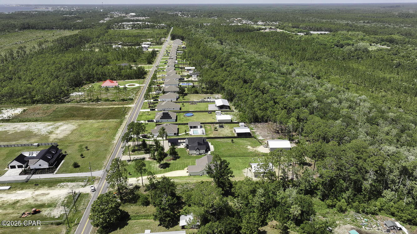 OVERSIZED LOT IN CITY LIMITS & NO HOA! Exceptional opportunity to build your dream home on 1.43 acres of prime land in the X flood zone. This homesite offers the perfect balance of privacy and accessibility, tucked away in a quiet area yet just minutes from everything this charming coastal town has to offer. Just a quick drive takes you into historic Downtown Port St. Joe, where you'll find boutique shops, delicious dining, and local markets that make this community so special. Outdoor enthusiasts will love the proximity to St. Joseph Bay, ideal for fishing, kayaking, and soaking up Florida's sun-drenched beauty. Enjoy the perks of small-town living with urban conveniences at your fingertips & don't miss your chance to own a piece of paradise that blends privacy, convenience, and coastal charm. Call for your private tour & LIVE THE BEACH LIFE!