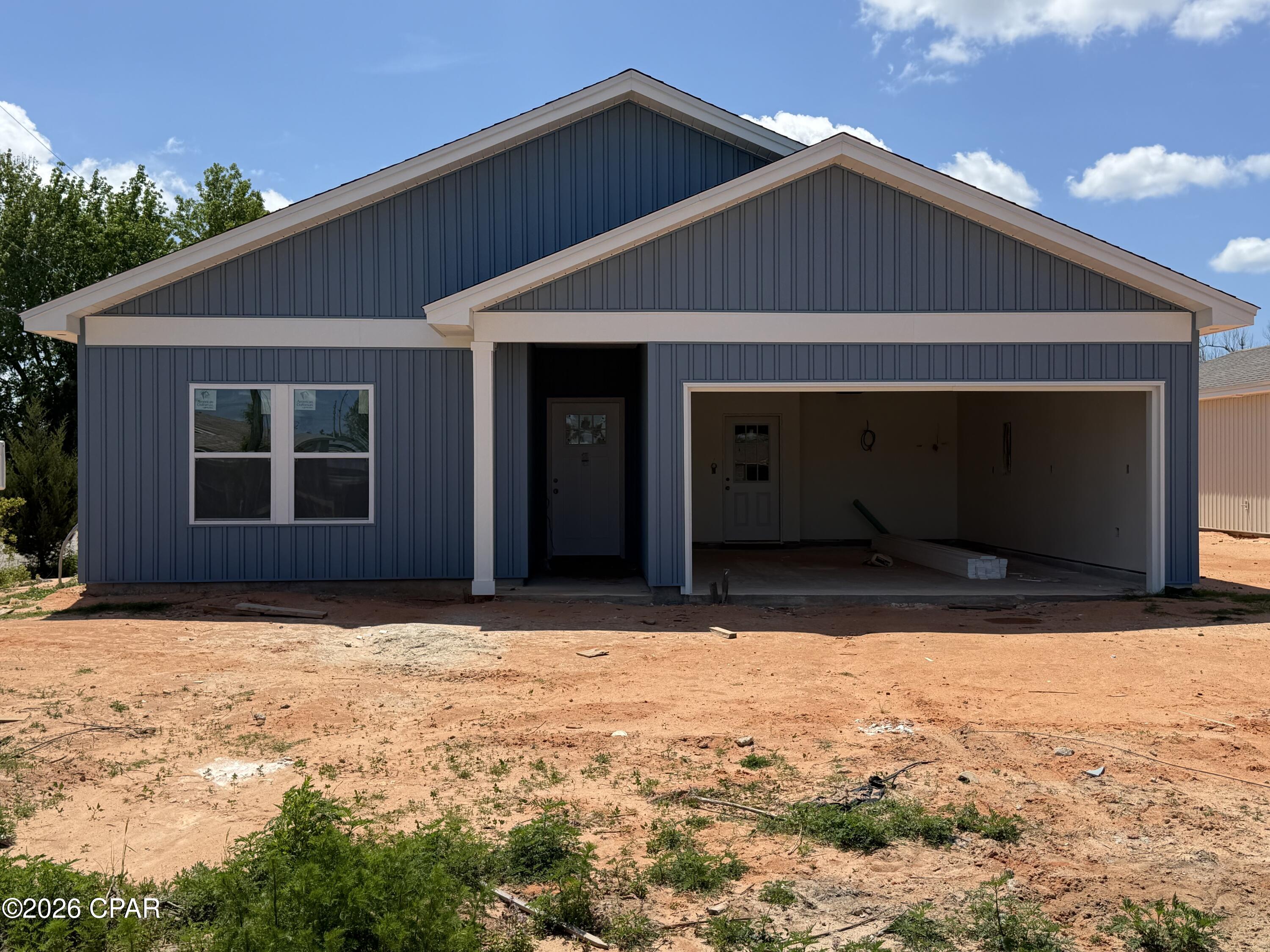 Currently under construction! Welcome home to this beautiful new 3 bedroom, 2 bath residence in Panama City with NO HOA--a great opportunity for first time buyers. Designed for everyday living, this home offers a bright, open concept layout with 9 foot ceilings and durable luxury vinyl plank flooring throughout, ideal for busy households. The kitchen features granite countertops, stainless steel appliances, a pantry, and plenty of space to cook while staying connected to the living area. The split bedroom floor plan provides added privacy, with a comfortable primary suite offering a double vanity, walk in shower, linen closet, and walk in closet. Two additional bedrooms and a full guest bathroom are perfect for children, guests, or a home office. A convenient mudroom with garage access helps keep things organized, while the covered back patio creates a relaxing space to enjoy family time outdoors. Thoughtfully designed and low maintenance, this home is a wonderful place to start your next chapter.  Home next door at 3112 is also available. If these floor plans don't fit your needs, seller is building three more homes in same block.