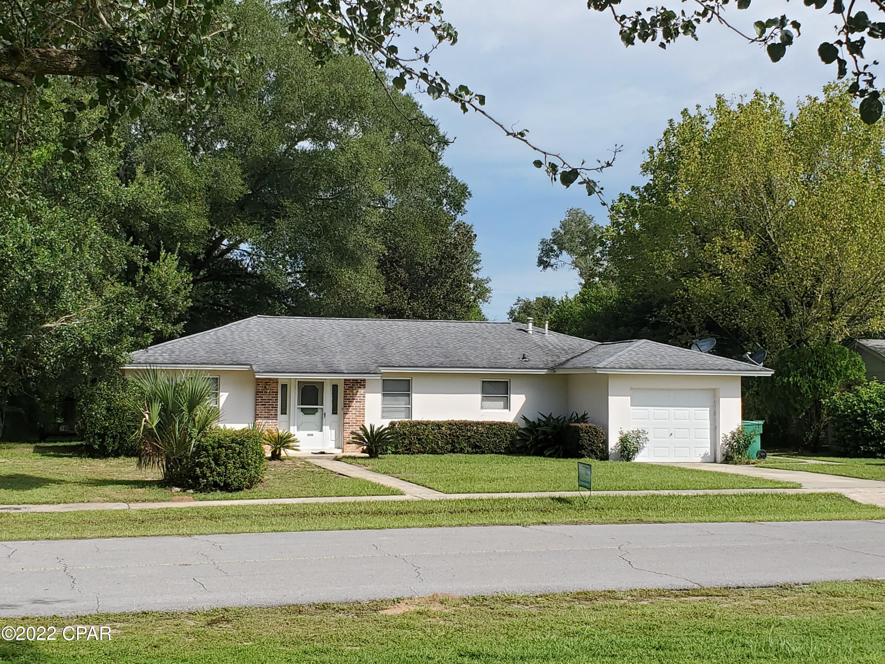 SUNNY HILLS! LOTS of action going on out here. Well-maintained 3bed/2bath priced to sell, so better hurry! Good-sized rooms, large, open living room/dining room, enclosed Florida room, beautiful back yard. Great area to be in. Sunny Hills is growing! Easy access to Chipley, I-10, airport (30 min.), Lynn Haven, PC, PCB, Pier Park, our gorgeous white-sand beaches & emerald green waters, not to mention tons of fishing holes, boating access, and recreational springs. Don't forget popular Boat Lake Recreation and Swimming Park right here in Sunny Hills! Call for your showing today! Furniture is negotiable.