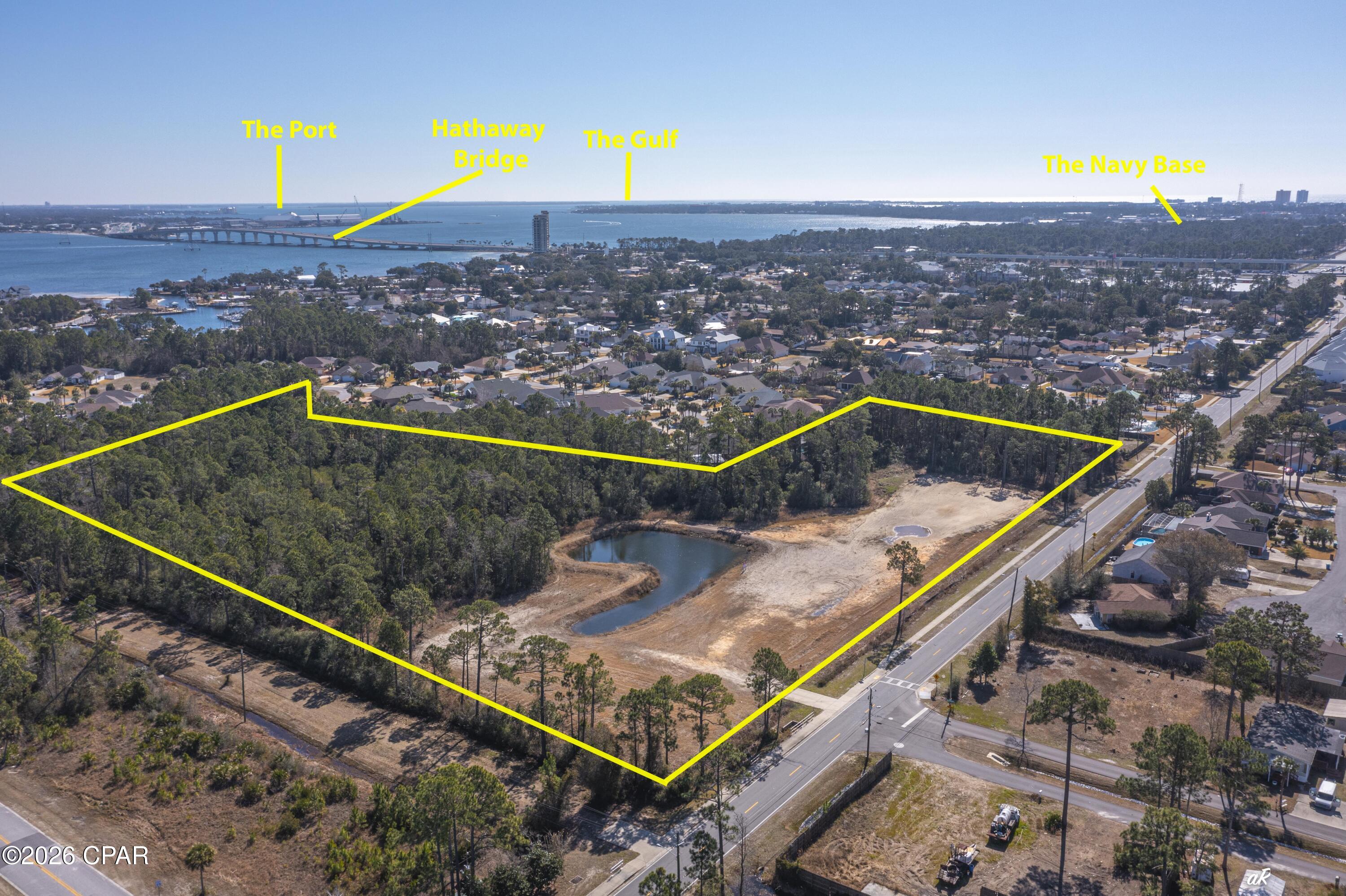 Location, Location, Location!  Beautiful 10.9 acres in Residential Area of Panama City Beach, just across the Hathaway Bridge and near the intersection of Thomas Dr and Middle Beach Road and Panama City Beach Parkway. This property is located in Bay County zoning area, zoned R3.  There are plans and drawings available from previous DO.  The site has approximately 5+ acres for development according to current plans, however ''new'' plans could possibly include more acreage for development with higher density.