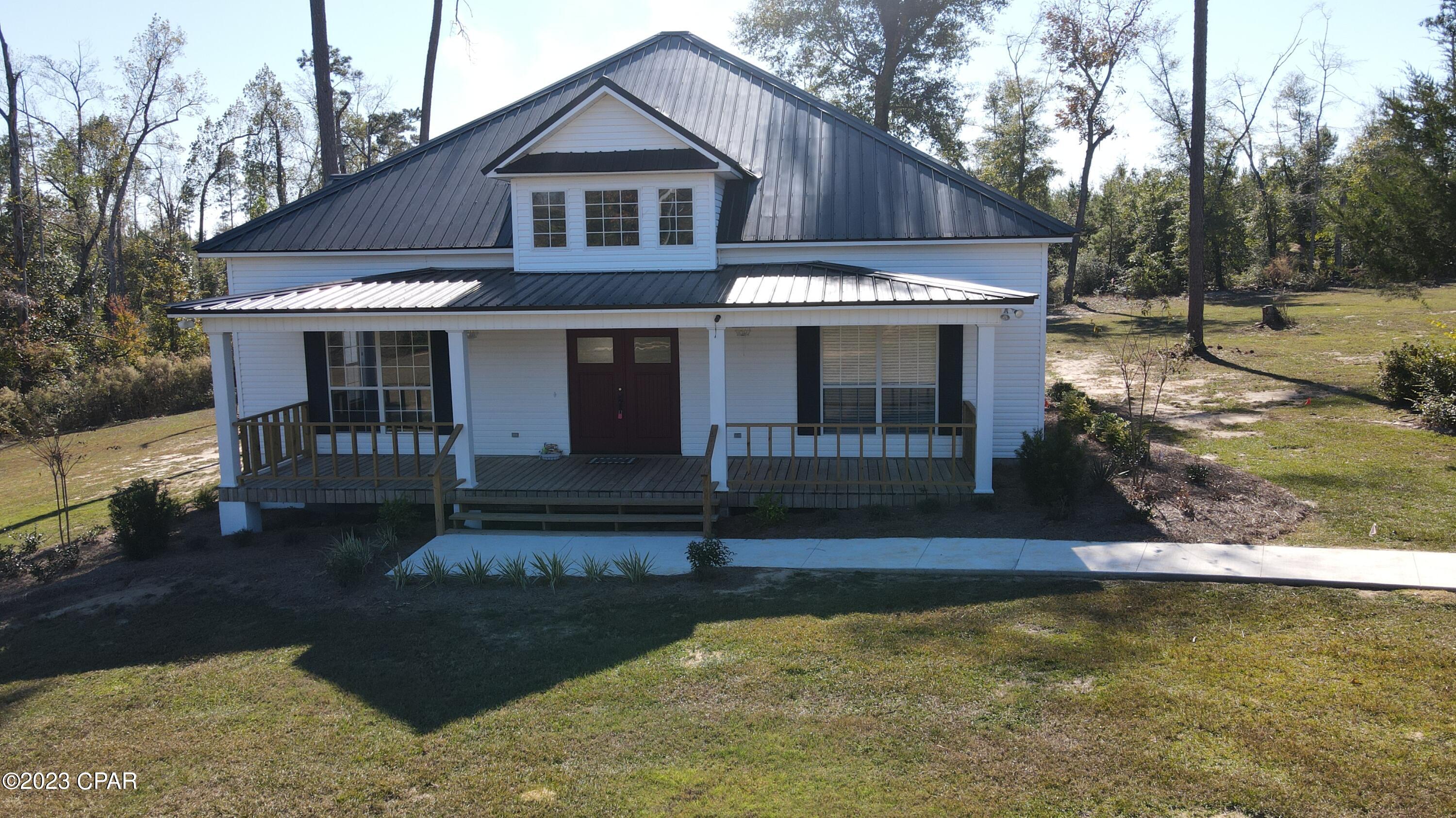Looking for a new home in the desired Indian Springs neighborhood? Look no further than this charming country home settled on a private drive with 1.4 acres. This beautiful home meets all the markers of comfort and convenience. Walk into 18' cathedral ceilings and notice the unique touches this home has to offer. Beautiful hardwood floors throughout the large open family room, 2 spacious guest bedrooms, and large master. Huge master bath complete with soaking tub, double vanity and separate shower. Enjoy cooking and dining in your kitchen while entertaining guests on the large deck out back. There is a detached 2 car carport, storage building with electric, and plenty of land to put a garden or pool. Call TODAY for your private showing!