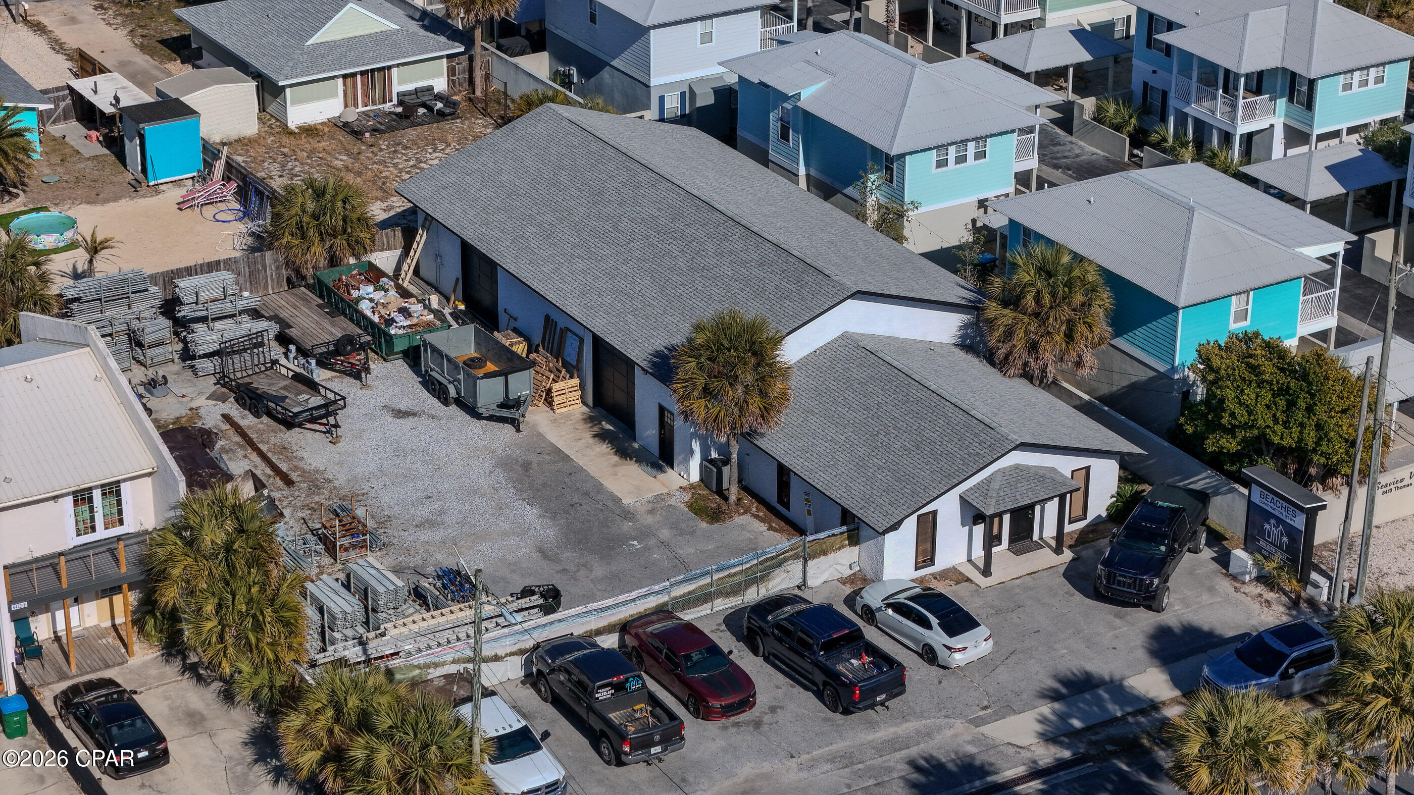 Incredible investment opportunity! Excellent location for flex space. The interior of the property boasts 3 offices, a lobby/reception area, kitchen and bath as well as approx 2,500 sqft of warehouse space with two 10x10 bay doors. The exterior boasts a fended in lay down yard and Thomas Drive frontage. Currently occupied by a general contractor tenant with income of $6,500/month NNN. Present lease term ends at the end of 2026. Great opportunity for retail, auto repair, contractors and more. Rare find in a location like this!