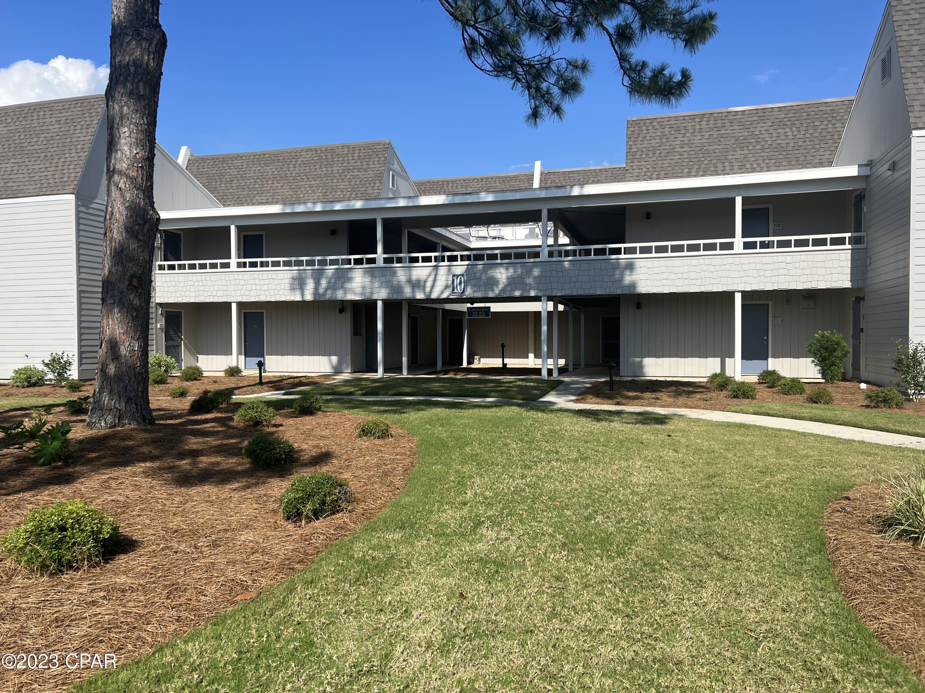 Boaters and Golfers delight! This ground floor unit is located within walking distance to the full service marina and to the clubhouse of the championship Nicklaus Golf Course! The unit has a 12'X32''  deck which is almost like and extra room. The deck faces east which means you have precious shade in the afternoons as you enjoy watching the golfers play the 6th hole of the Nicklaus Golf Course. The interior of the unit features a renovated kitchen with granite countertops, stainless steel appliances, and tiled flooring everywhere except the bedroom. The owner spends much of the year traveling so the appliances are barely used. The A/C unit and appliances were replaced in 2016 and are in perfect working order. The doors, windows, and exterior siding of this well maintained condo complex were replaced in the past few years. Located in the gated community of Bay Point with 24 hour gate and roving security, a championship Nicklaus Golf course, clay tennis courts, several restaurants, and a full service marina which is just a short boat ride to the Gulf of Mexico and the St Andrews Bay!