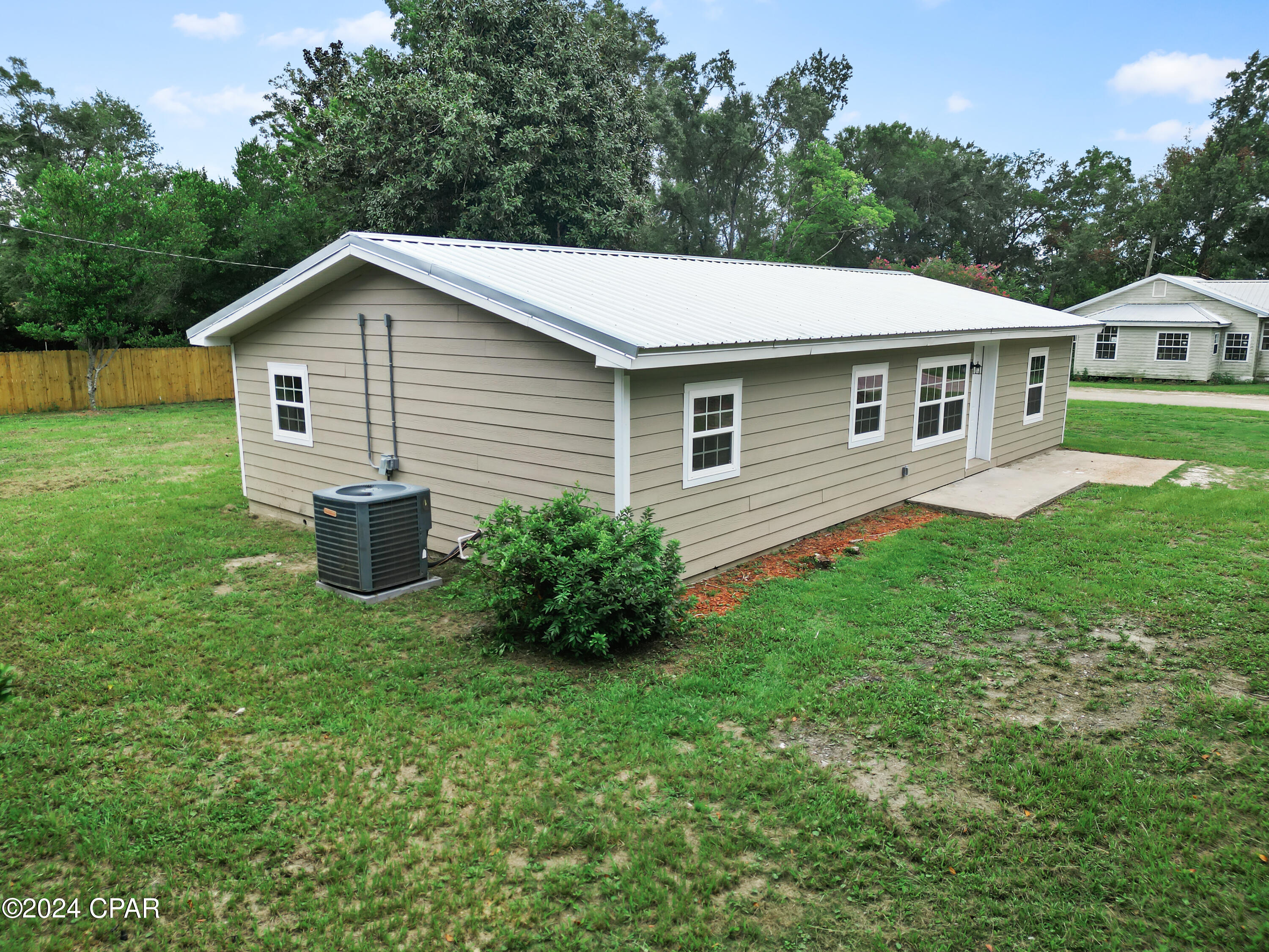 This newly renovated 3 bed, 2 bath home in Blountstown, FL is a great find for under $200k. Situated on over an quarter-acre, it offers plenty of outdoor space. With new appliances, flooring, and a metal roof, it's move-in ready. The property is USDA eligible for a zero down payment, making it ideal for first-time buyers. Conveniently located near schools, shopping, and dining, this home is perfect for a family or those in need of extra space. Don't miss out on this great value in Blountstown, FL.