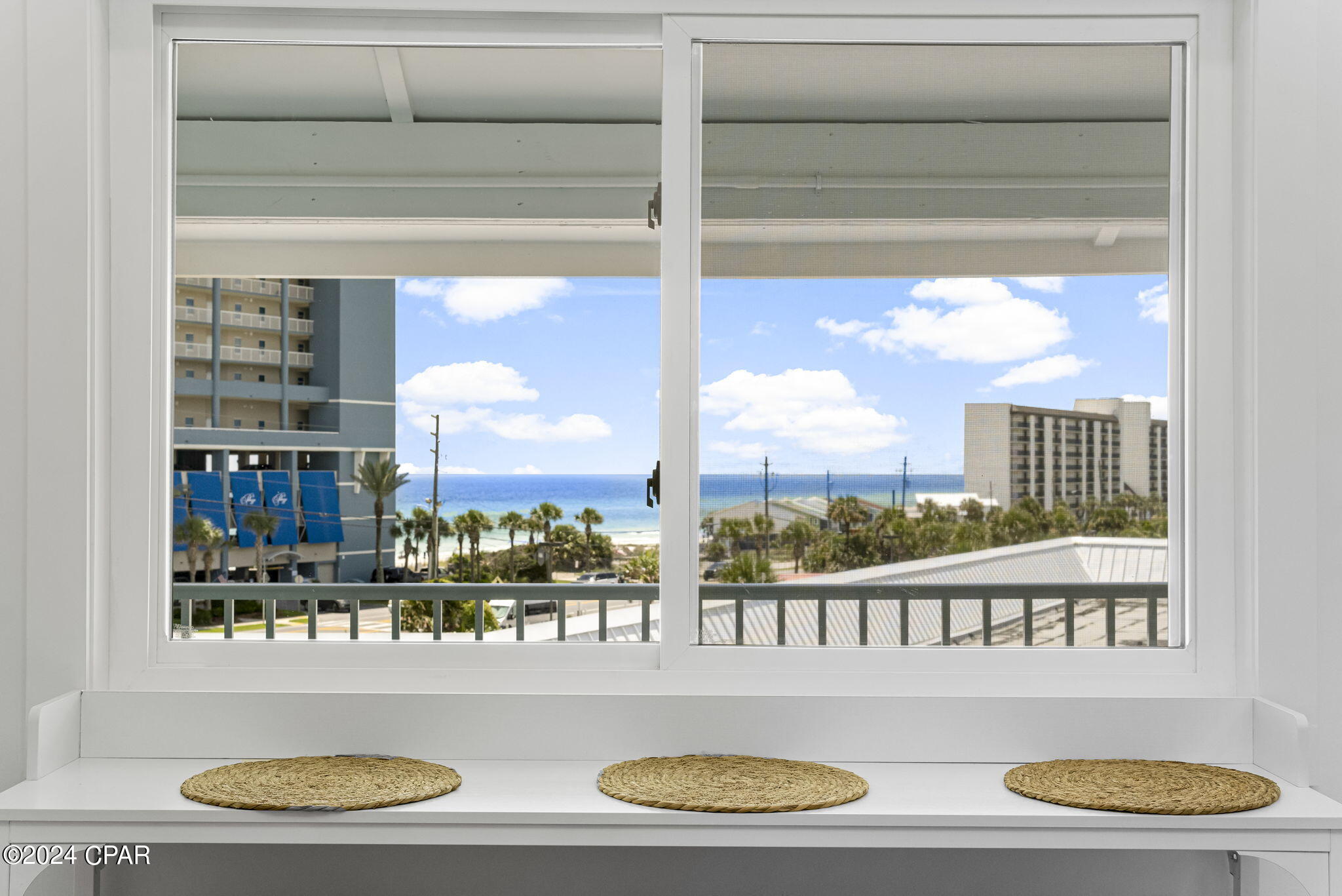 Welcome to Sand Castles West on the highly sought-after West End of Panama City Beach--just steps from the sugar-white sands and emerald waters and minutes from Pier Park's dining, shopping, and entertainment.
This top-floor, fully furnished condo has been completely remodeled from the studs up and offers gorgeous Gulf views along with a true turnkey experience. Professionally designed by J Larae Designs, the interior features vaulted ceilings, recessed lighting, shiplap accents, and a bright, coastal-modern aesthetic throughout. No detail was overlooked with major upgrades including all new HVAC (inside and out), ductwork, electrical wiring and panel, insulation, drywall, Delta plumbing fixtures, Samsung kitchen appliances, GE laundry center, new pocket doors, and an added owner's closet.
The exterior has also undergone a full renovation with new windows, sliding glass doors, balconies, Hardie board siding, walkways, stairs, and railings--with the $90K assessment already paid. Over $100K in interior improvements make this property stand out as essentially brand new.
Enjoy community amenities including a sparkling pool, and easy beach access directly across the street. With proven long-term rental history already in place, this property is not only a beautiful coastal retreat but also a strong investment opportunity.
Whether you're looking for a second home, full-time residence, or income-producing property, this one checks all the boxes. Schedule your private showing today.