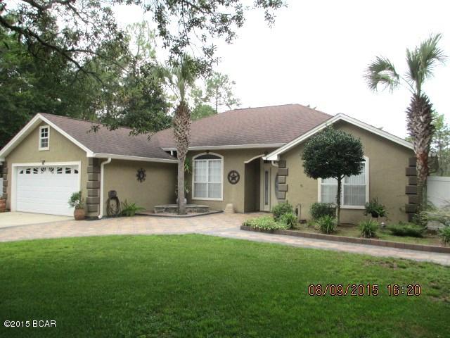 THIS IS A HOME FOR ALL SEASONS! WHEN YOU PULL UP TO THE DRIVEWAY YOU WILL SEE THE LARGE DRIVE WITH PAVERS & A 2ND DRIVEWAY ON THE OTHER SIDE OF THE HOME, PLENTY OF ROOM FOR COMPANY,BOATS, MOTOR HOME & ALL YOUR TOYS!THIS OPEN FLOOR PLAN FEATURES SPLIT BEDROOMS, THE WOOD FLOORS ARE 3/4'' OAK. THE KITCHEN HAS NEWLY INSTALLED GRANITE COUNTER TOPS, ALL KITCHEN APPLIANCES WILL REMAIN, THE SELLERS ARE USING A BEDROOM AS A CLOSET WHICH COULD BE EASILY CONVERTED BACK TO A BEDROOM IF DESIRED.  THE HOME IS WIRED FOR SURROUND SOUND. THE YARD IS HUGE & IS PERFECT FOR THE WHOLE FAMILY!  AN IN GROUND POOL WITH HOT TUB & WATERFALL. THERE IS AN ENCLOSED PATIO, A LARGE PERGOLA & A FIRE PIT.  GUTTERS HAVE BEEN INSTALLED, THERE IS A SPRINKLER SYSTEM, THE SELLER HAS BUILT UP THE YARD 4' AROUND THE POOL,