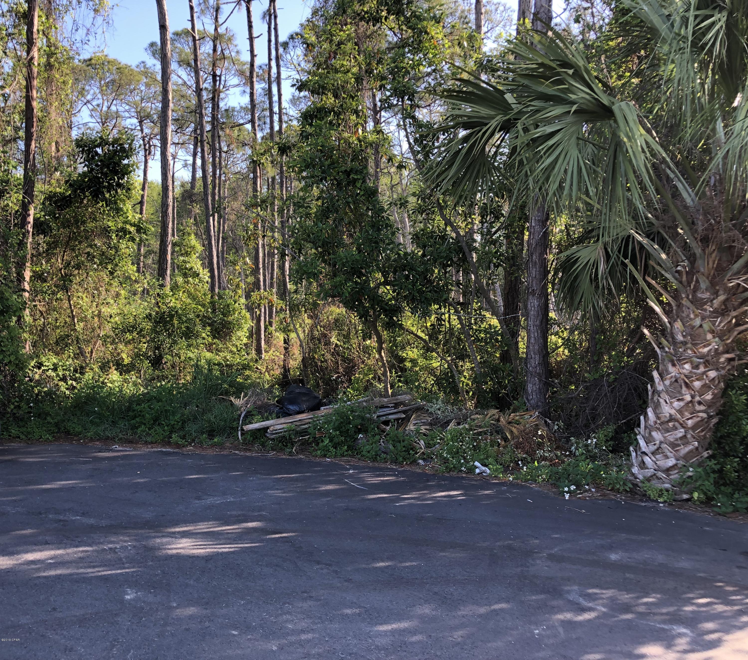 ***South side of back beach road in a cul de sac*** Least expensive buildable lot on the beach with NO HOA fees! No more than a 5 minute walk to the beach. Build your dream home on this very large lot that's within minutes from the best restaurants, schools, amenities... and Pier Park! Seller says bring an offer! All information is approximate and should be verified by buyers if important