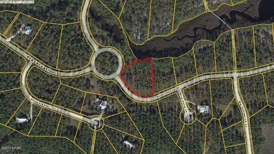Build your dream house on this beautiful wooded corner lot in Rivercamps offering pool, clubhouse, library, fitness center, canoeing/kayaking, walking/hiking trails, dock/boat slips, fishing and more.  Located on Crooked Creek and West Bay this pristine neighborhood is just a short drive to our airport and beautiful beaches.  No build out time!  ALSO! Where else can you purchase over an acre for under $60,000 in a gated community with so much to offer?