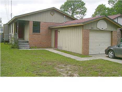Very nice home with open floor plan, ceramic tile and carpet, breakfast bar, deck on back, washer and dryer hook-ups, skylights, 1-car garage, and privacy fenced back yard. Excellent location to Tyndall AFB!