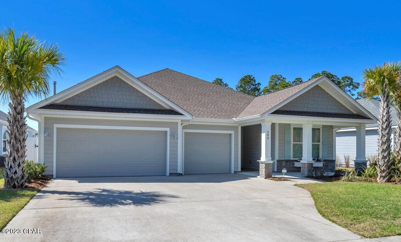 CURRENTLY UNDER CONTRACT, SELLER WILL CONSIDER BACKUP OFFERS. Must -See, move in ready 5 bedroom/3-bathroom masterpiece with private pool overlooking tranquil lake.  Built by Southern Coastal Homes in 2019 with significant builder upgrades. This popular single level floor plan features a 3-car garage. The coastal inspire design makes you feel welcome the minute you walk through the grand entrance. The stunning Great Room with panoramic views of the outdoor living space, private pool and lake, features a high ceiling with beam accents and a built in electric fireplace. The open floor plan draws you to the gourmet kitchen with center island, quartz countertops, custom cabinetry with soft close drawers and stainless steel appliances. The Primary Suite with tray ceiling, shiplap walls, expansive tiled shower with two shower heads, double vanity and large walk-in closet, provides a secluded retreat. Three additional bedrooms located throughout the home have access to full baths. The 5th bedroom, located just off the Great room can also be used as an office, home gym or theater room.  In addition to the significate builder updates a new tankless hot water system, new gutters were recently added to the home. The home is also wire for a home generator. The beautiful outdoor living space overlooks the lake and includes a covered patio, lush landscaping, a private saltwater pool and perimeter fence. Located in Breakfast Point, one of the most sought after neighborhoods in Panama City Beach, the home provides quick and easy access to the white sandy beaches of the Gulf of Mexico, shopping, dining and entertainment.