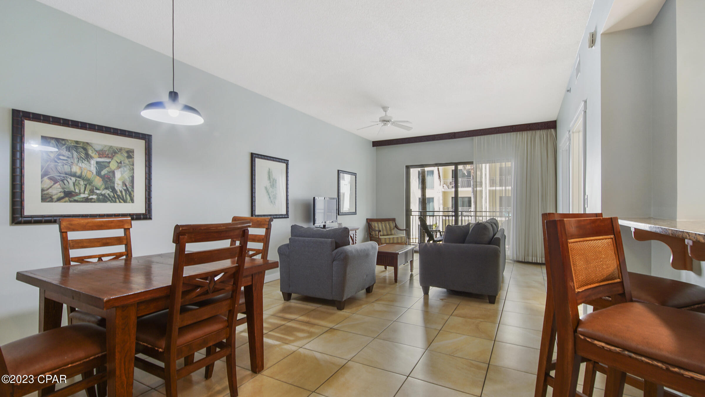 Origin at Seahaven unit! This vacation rental had $26,000+ gross rent for 2022.  The unit overlooks the pool and has Gulf views.  Keep the unit as a rental, have the perfect vacation getaway, of love in it full time! Amenities include gated access,  large pool, movie theater, deeded beach access, grilling & picnic areas, and exercise room. Origin is across the road from Sharky's Beachfront Restaurant, 1 mile from Pier Park, and surrounded by entertainment! All measurements are approximate, verify if important.