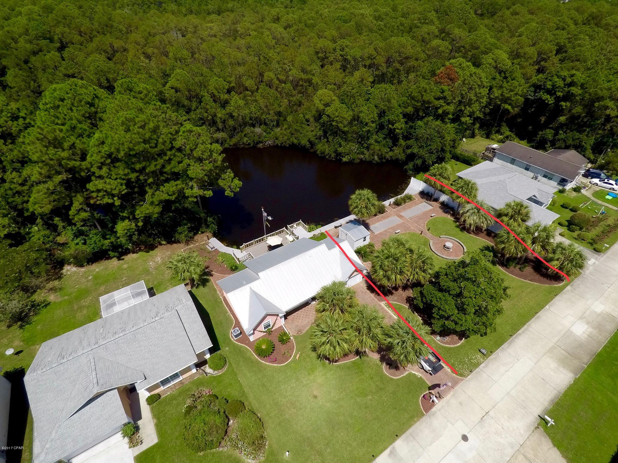 No HOA and NO Build out! Buy now and build your home in the future!  Rare opportunity to live on a lake in the middle of Panama City Beach! Build Your Home on this awesome lot in Panama City Beach! This 75 x 106 lot has been improved with a seawall and a deck across the back! The location is perfect!  Pier Park, The World's Most Beautiful Beaches and all Panama City Beach has to offer are just minutes away from this lot. Please Call Us Today!
