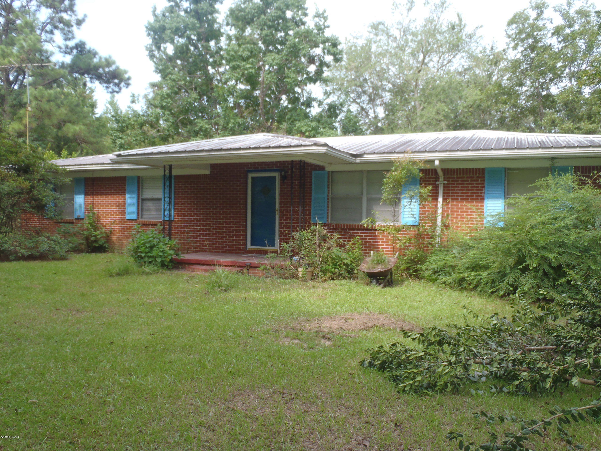 Tucked away on this 35 Acres you will find a well kept 3 Bedroom, 2 Bath Brick home with outbuildings. Property features include a wet weather pond, hardwoods and pines, around the home are several fruit trees, Pecan trees, a grape orchard, garden area, flowering landscape and plenty of pretty shade trees.  Call today to make your appointment to see this Country Respite!