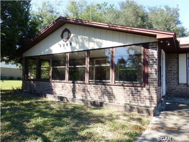 PRICE REDUCTION!!! TAKE ANOTHER LOOK!! Bank owned and priced right! Don't miss out on this diamond in the rough! Centrally located this 3 bedroom 2 bath home with a sunroom/front porch is waiting for you! This home features an oversized living room and family room! Warm and inviting eat in kitchen with a full appliance package and a pantry is a chef's dream! Covered carport and oversized driveway allows for plenty of parking! Call today for your private showing!