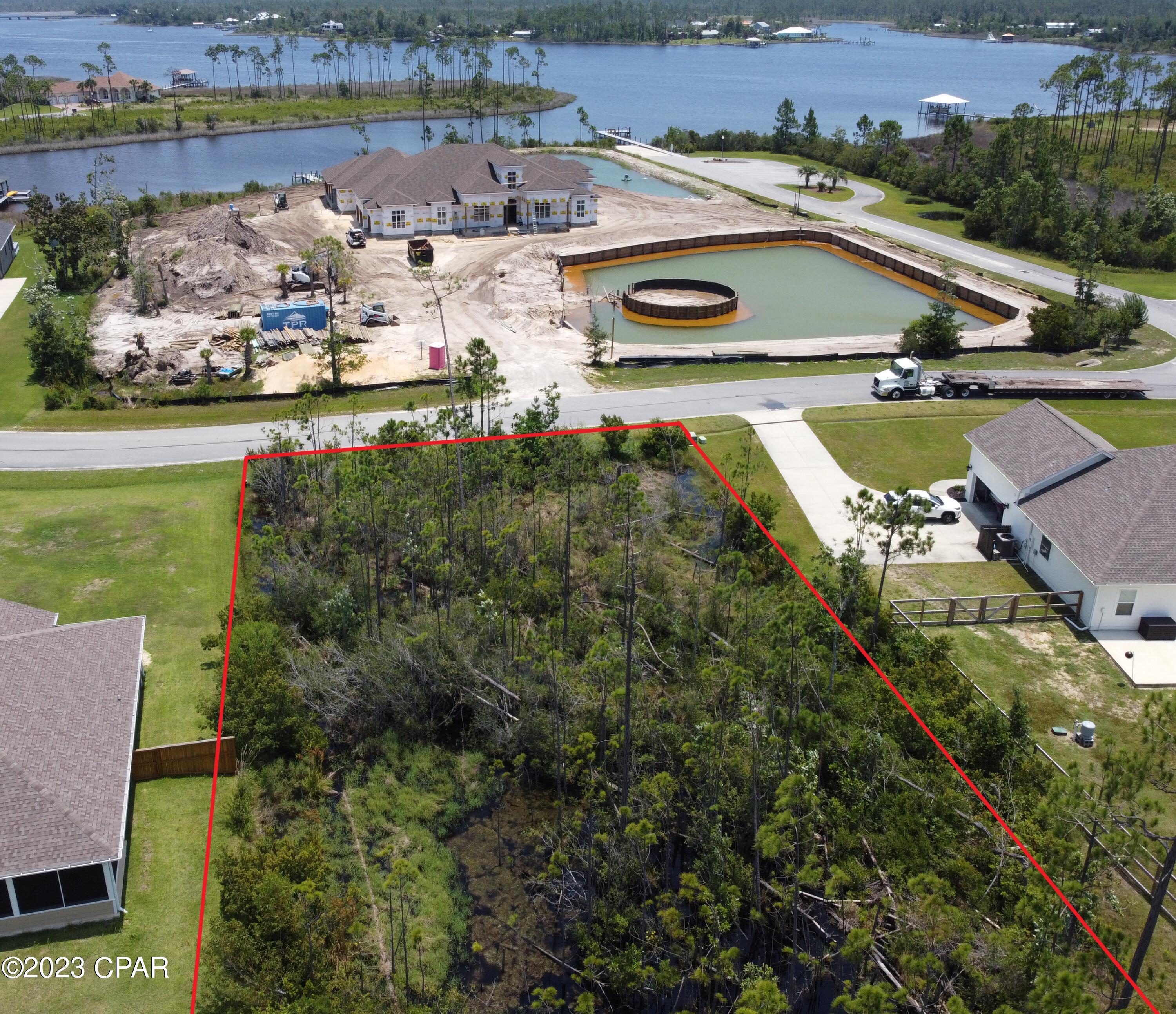 New to the market! A beautiful homesite in the desirable Laird Bayou. At over 3/4s of an acre there is plenty of space for you dream home. Beautiful view from across the street. Just steps to the Community Pool and Bathhouse. Boat launch inside the community so every lot has water access. No waiting in long lines at public ramps to launch your boat. Rv/boat storage as well. Laird Bayou is a gated waterfront community with ribbon curbed streets and underground utilities. Beautiful custom builds throughout. Schedule your tour today!
