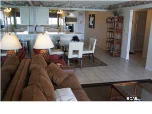 LOWEST PRICED TWO BEDROOM, TWO BATHROOM, FULLY FURNISHED CONDO IN REGENCY TOWERS! RENTAL MACHINE! BARGAIN BASEMENT PRICE! Come and make the World's Most Beautiful Beaches your home. You won't find a better positioned condo in Regency towers as this unit is on the 7th floor with unobstructed views of the Gulf of Mexico both east and west as far as the eye can see. This unit has been a fantastic rental for the current owners, but because of the need to quickly consolidate, they are offering this unit at a bargain basement price. This two Bedroom / two bathroom, Gulf front condo, with master facing the gulf, has sliding glass doors which lead from the master bedroom to the balcony overlooking Regency Towers main pool. This condo comes fully furnished. Regency Towers is located near