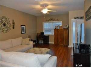 Just reduced :Annabella's Town Homes! You deserve the affordable luxury this gated community has to offer! Enjoy lounging poolside or take a relaxing stroll around the lushly landscaped grounds. This is your chance to own a beautiful 2 bedroom 2.5 bath town home in the Panama City Beach area. The open floor plan features stainless steel appliances in the kitchen, as well as granite countertops. There is also a separate pantry for extra storage. The spacious Master bedroom includes his and her closets and lush carpet. There is a double vanity in the master bath as well as a linen closet.