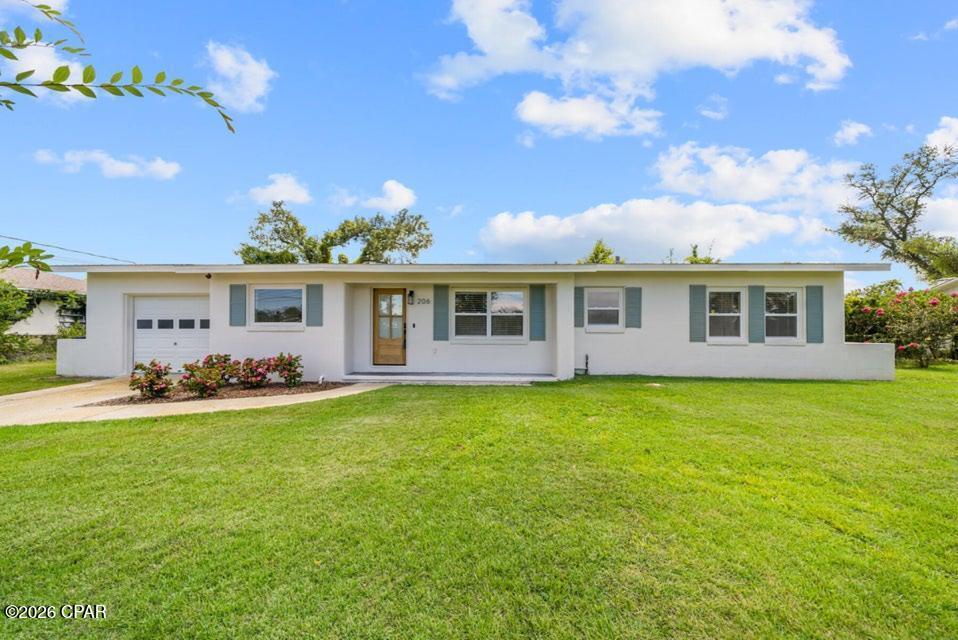 Welcome to the coveted South Cove Terrace Drive in the ever growing Cove neighborhood. This home received a complete makeover from the studs up in 2016 and has been maintained immaculately, keeping the restored but original hardwood floors throughout the renovations. The total renovation in 2016 gave this home an open floor plan, rare to find in the Cove. Roof was replaced in October of 2023. All appliances were replaced at the time of the renovation as well as HVAC, plumbing, electrical, and spray foam in the attic making this house very energy efficient. During the renovation, the window in the third bedroom was eliminated, this room can still be used as a bedroom, en suite to the master, game room, office, nursery, etc. Very large lot for the neighborhood, and irrigated throughout with a 2024 installed irrigation well. Parking for three cars in the alley with a gated fence. South Cove Terrace Drive is one of the very best roads in the entire neighborhood, offering a very wide road, sidewalks, a playground/park at the end of the road, and being the dedicated Trick or Treating road in the Cove. Please verify room measurements if important.