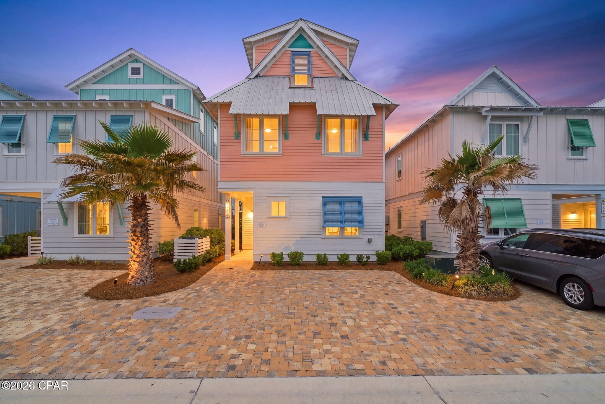 Welcome to the kind of coastal home that feels like a vacation the moment you walk in. Located in Margaritaville Cottages, this newer construction offers 5 bedrooms and multiple levels of outdoor living designed for gathering, relaxing, and making the most of every beach day.

Step inside and you're greeted by a bright, clean interior with a coastal palette, natural light pouring in, and a layout that comfortably accommodates a full house. The kitchen anchors the main living space with modern finishes and plenty of room for everyone to come together after a day in the sun.

Each bedroom offers privacy and comfort, making it ideal for hosting guests or maximizing rental potential. The real standout here is the outdoor space, with multiple balconies and lounging areas that let you soak in the warm Gulf air from morning coffee to evening wind-downs.

Just a short distance to the beach and surrounded by one of the most sought-after resort-style communities in Panama City Beach, this property delivers the full experience buyers are looking for--whether it's a second home, full-time residence, or income-producing investment.