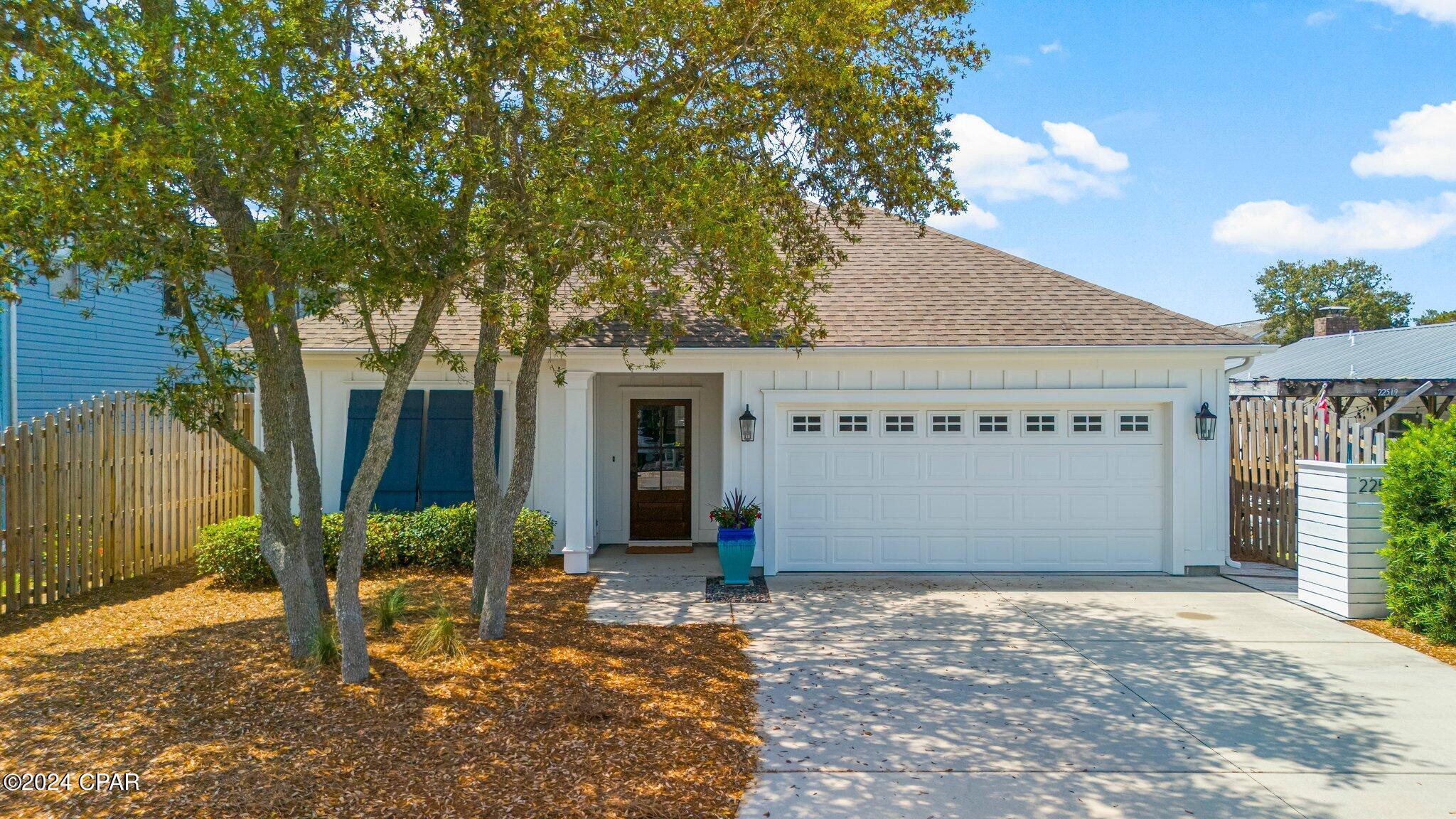 CURRENTLY UNDER CONTRACT, SELLER ACCEPTING BACKUP OFFERS. Welcome to this coastal gem located on the highly sought-after far west end of Panama City Beach. A quick 5-minute stroll to friendly beach access makes coastal living effortless. With no HOA fees or rental restrictions, this property offers both flexibility and investment potential. Enjoy the convenience of nearby shopping and dining, with Publix and Aldi just blocks away, along with a pedestrian path providing easy access to scenic 30A, Pier Park, and numerous local hot spots. This home features a thoughtfully designed open layout centered around an expansive kitchen island that flows seamlessly into a dedicated dining nook. The Florida-style mudroom, walk-in pantry, and spacious laundry room add that extra level of functionality that truly sets this home apart. The primary suite is complete with a walk-in closet, large walk-in shower, double vanity, pocket-doored water closet, and a linen closet. Bedroom two comfortably accommodates a king-size bed with side tables, while bedroom three offers versatility with a custom queen Murphy bed and built-in storage. Situated on a generous lot, this home features an 8-foot fenced backyard for added privacy and a screened back porch serves as the perfect place to enjoy your morning coffee and on some mornings listen to the waves. You won't find a better neighborhood in all of PCB!